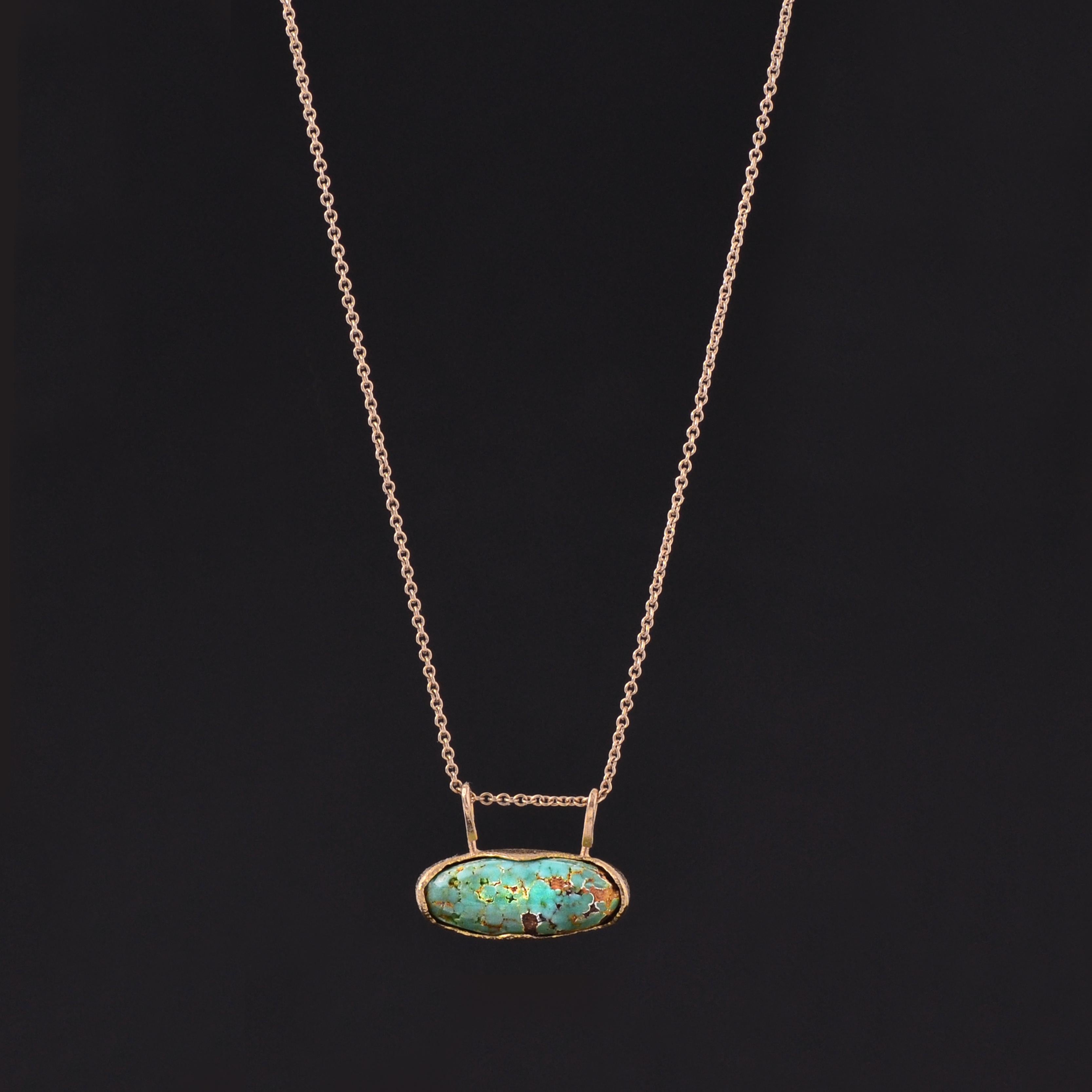 This Turquoise and 18kt yellow gold pendant is like a piece of blue sky wrapped up in a yellow gold wave – like floating on your back in a sky-blue lake being held up by the warm water with the sun in your eyes.

This is the piece of jewelry that