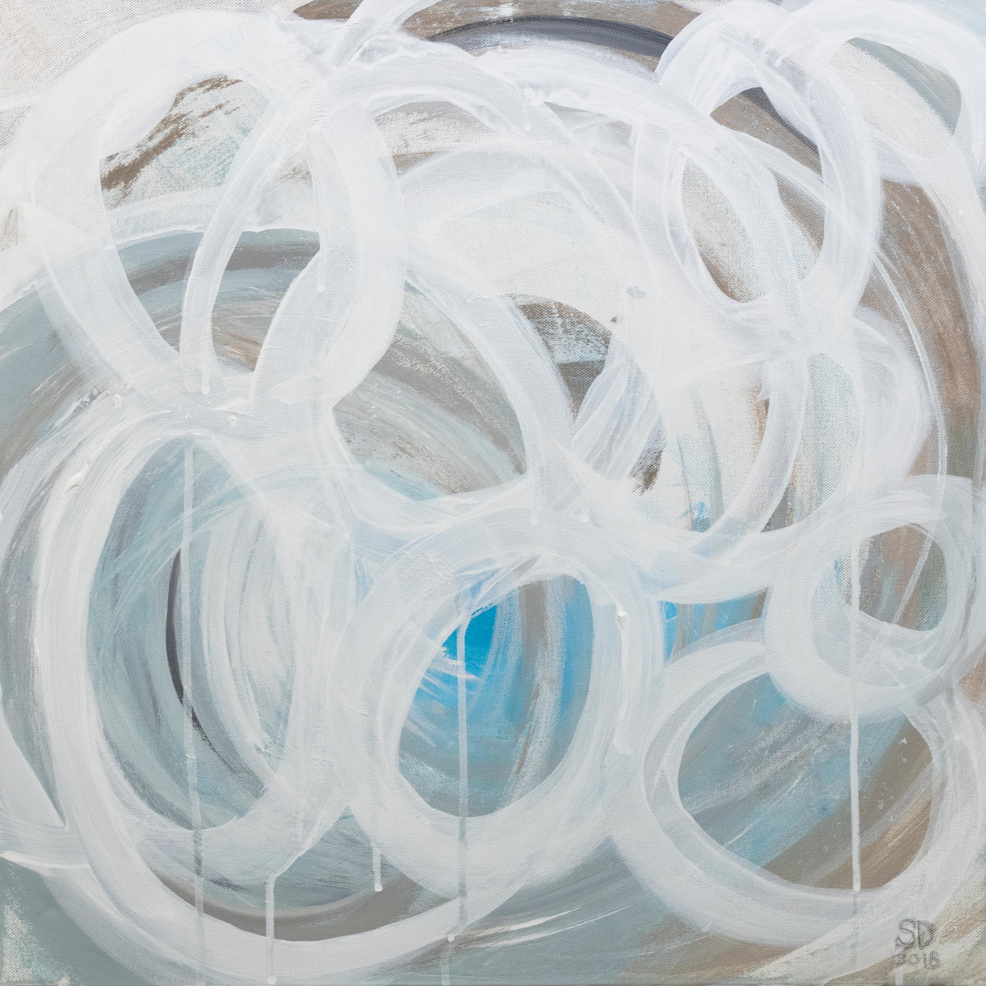 This abstract painting by Sue De Chiara is made with acrylic paint on canvas. It features a light blue-grey palette, with white circular shapes applied in light, loose strokes across the composition. The painting has clean, white painted sides, and