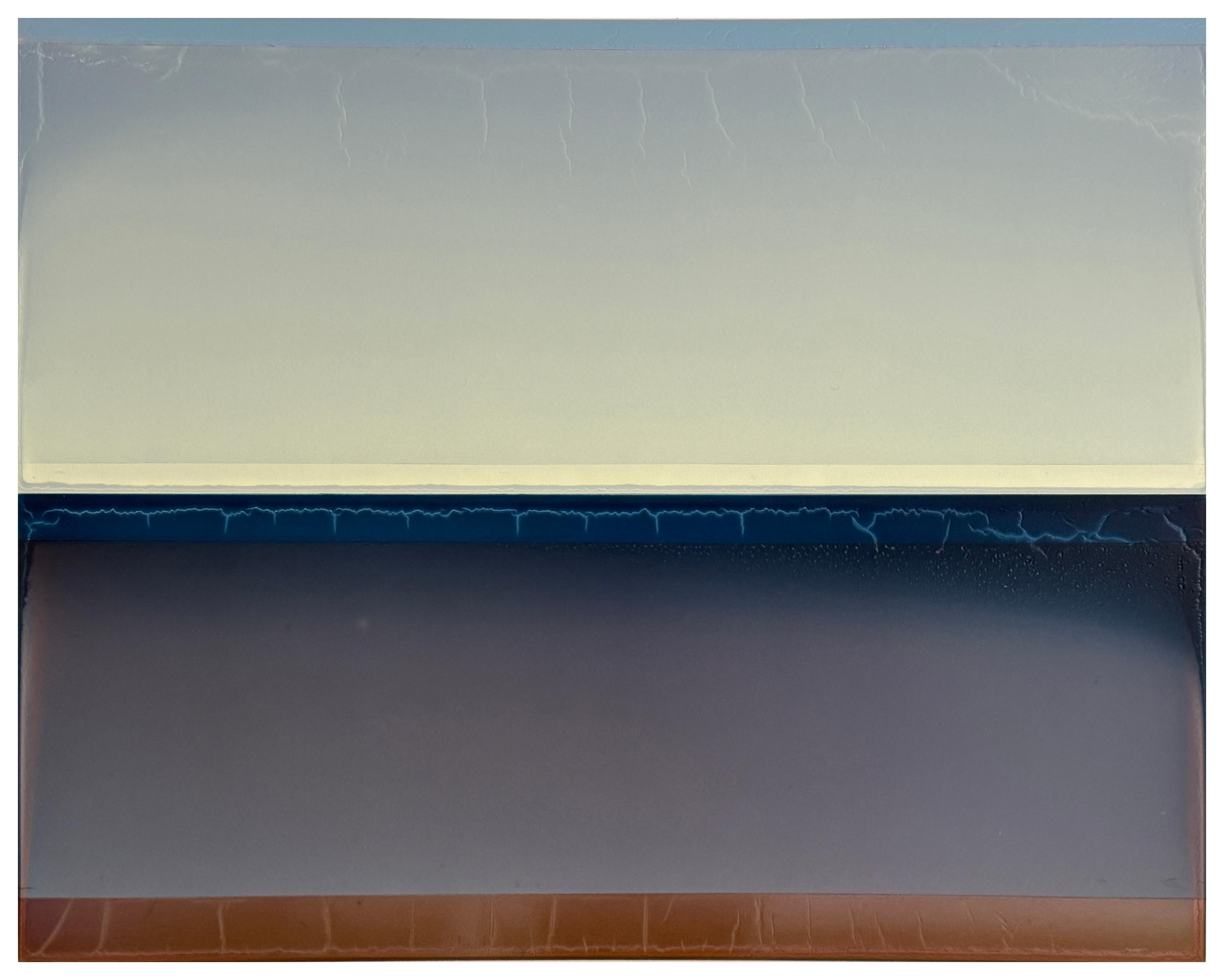 Ethereal and minimal, Susan English’s paintings play with light and space. She employs transparent pigments and layering to manipulate light and illuminate her color fields. Soft variations and subtle textures appear across the gauzy surfaces