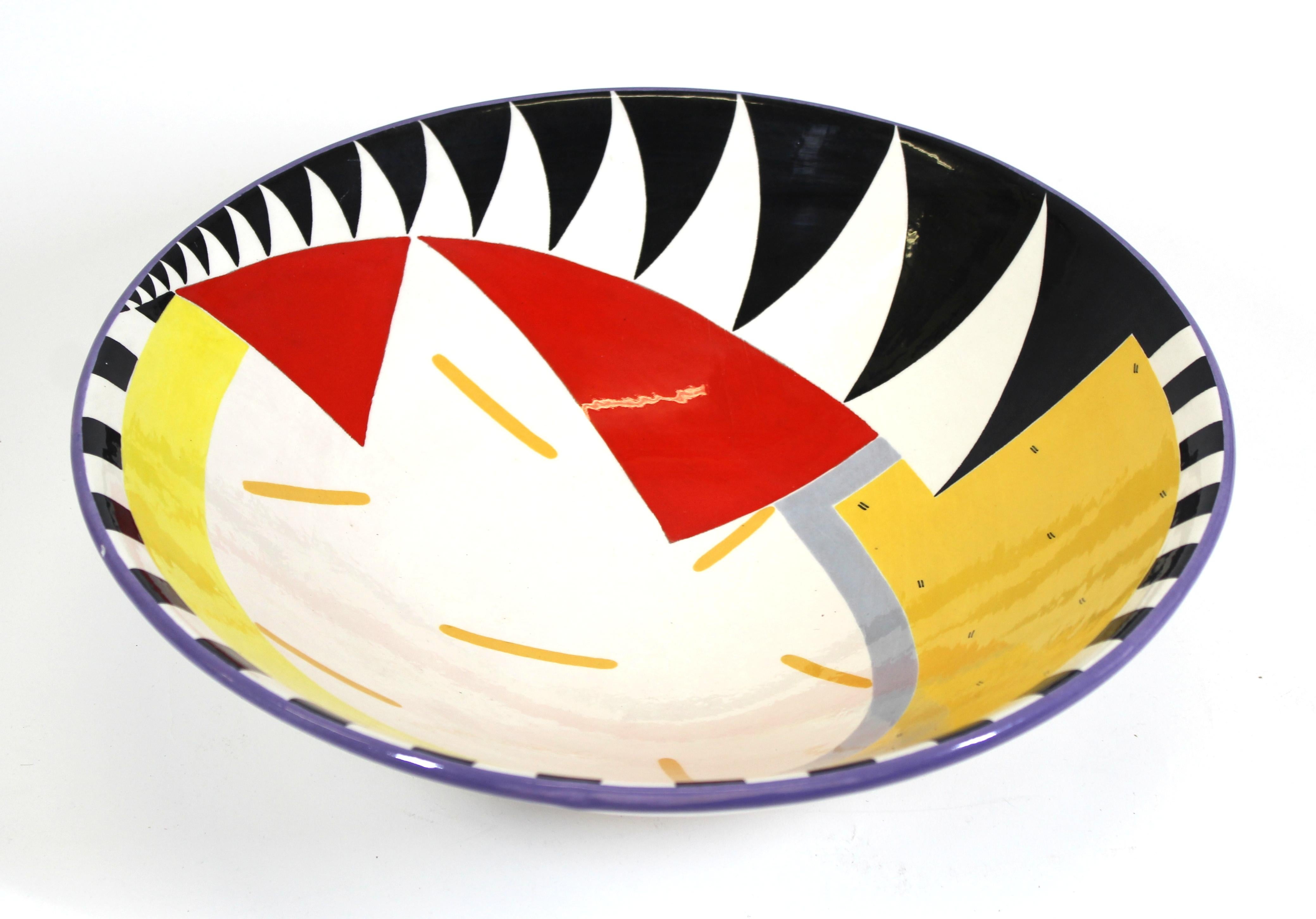 Susan Eslick American Postmodern art pottery hand painted bowl, signed and dated 1989 on the bottom.
