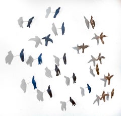 Shifting Migrations (21 Blue & Bronze Birds)