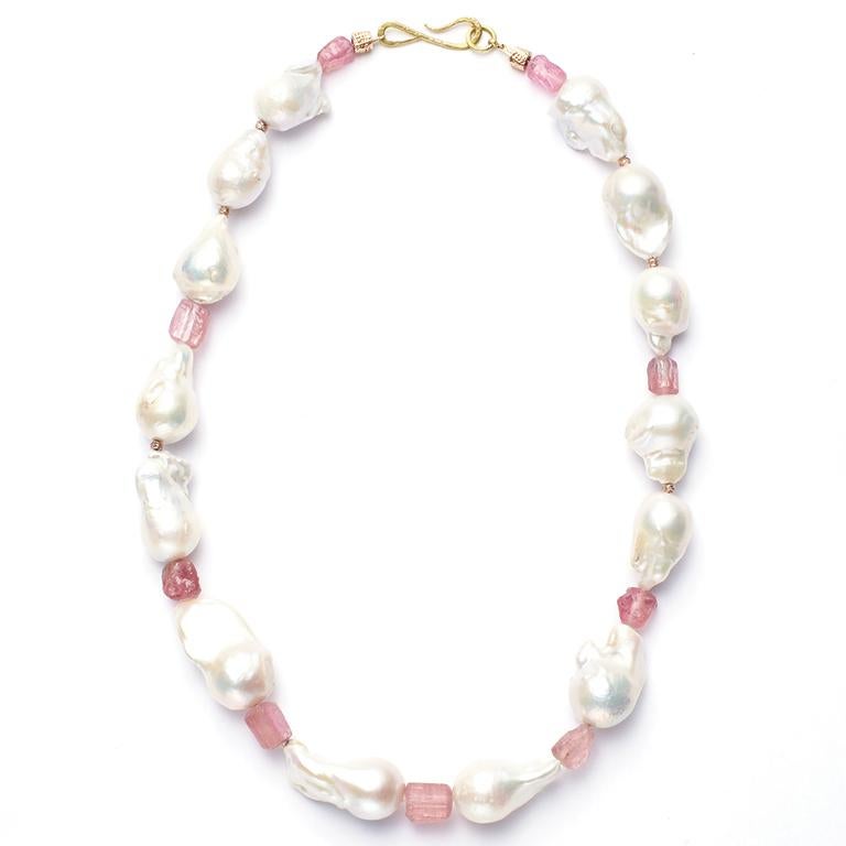 Freshwater Baroque Pearls and Pink Tourmaline play wonderfully with light and color, combining elegance and versatility.

Length: 18