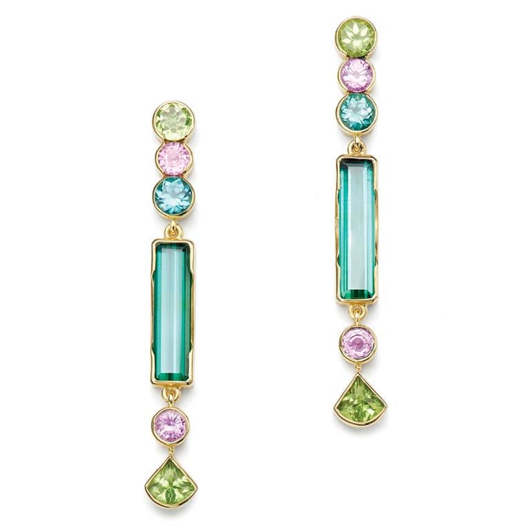 A brilliantly beautiful color palette of Green Tourmaline, Peridot and Pink Sapphires sparkle in these drop earrings, set in 18kt Gold.

Pink Sapphire: 1.70 Carat   
Green Tourmaline: 2.20 Carat
Peridot: 2.23 Carat
Long Green Tourmaline: 5.70 Carat