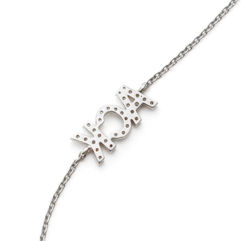 The Nantucket “ACK” in Diamonds Necklace in 18kt White Gold is representative of the Nantucket Memorial Airport call letters and a wonderful way to remember your time on the magical island. 

Also available in 18kt Yellow Gold, as pictured styled
