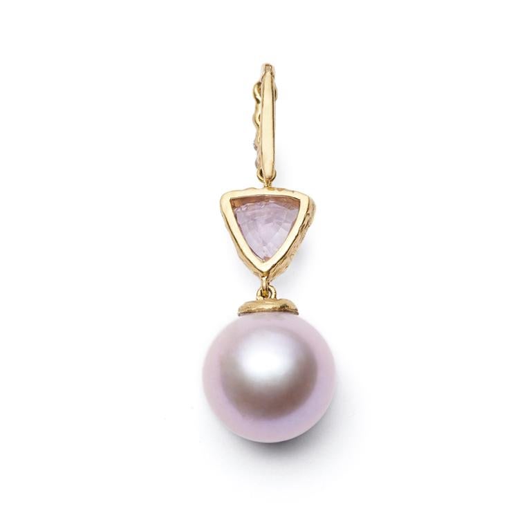 Set in 18kt Gold, our Pink South Sea Pearl and trilliant cut Sapphire Pendant features a Diamond studded bale that can be attached to pearls or suspended from your favorite chain. 

Twist Chain sold separately.