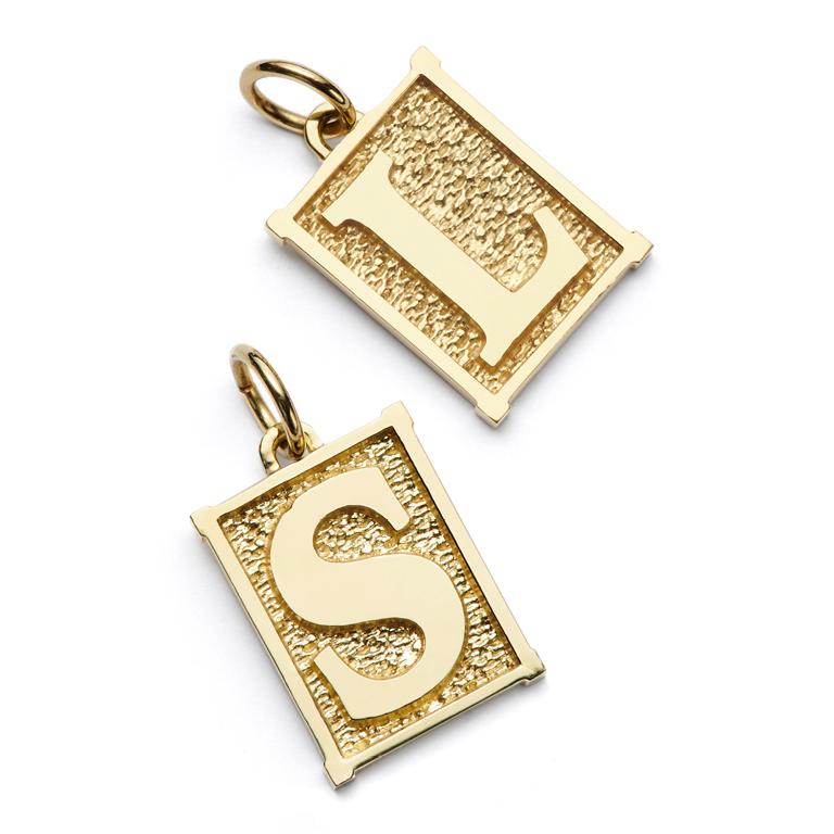 From The Alphabet Collection™, every letter in an array of amazing pendants/charms in 18kt Yellow Gold.

Mix and match. Wear your initials on a necklace or bracelet or create your own statement ... the possibilities are endless! 

Price reflects a