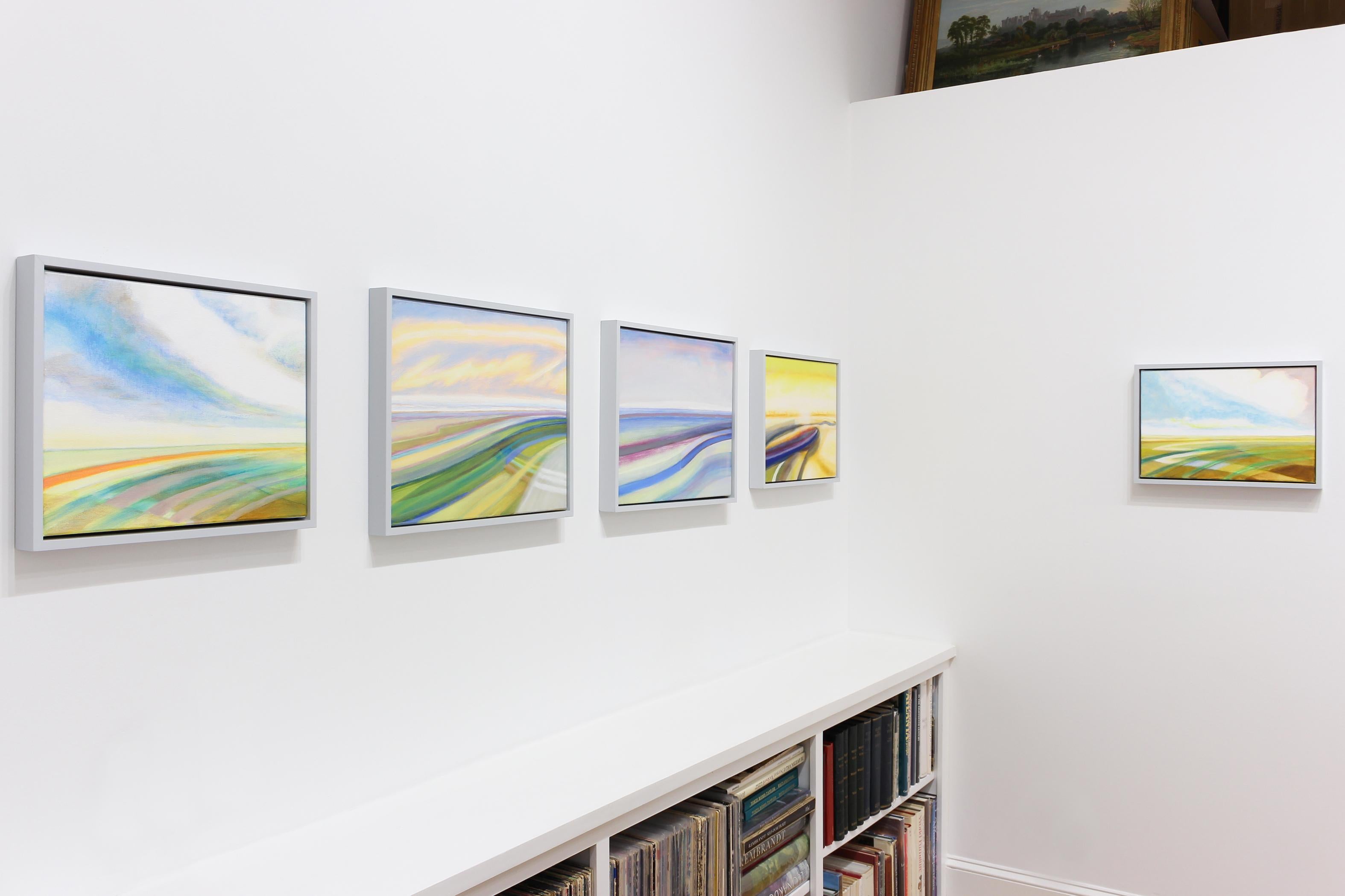 This painting features hues of yellow, blue and purple. This piece is framed in a light blue-grey wooden framed measuring 15 by 18 inches.

Memphis-based painter, Susan Maakestad is attracted to the spaces between things, the unnoticed marginal