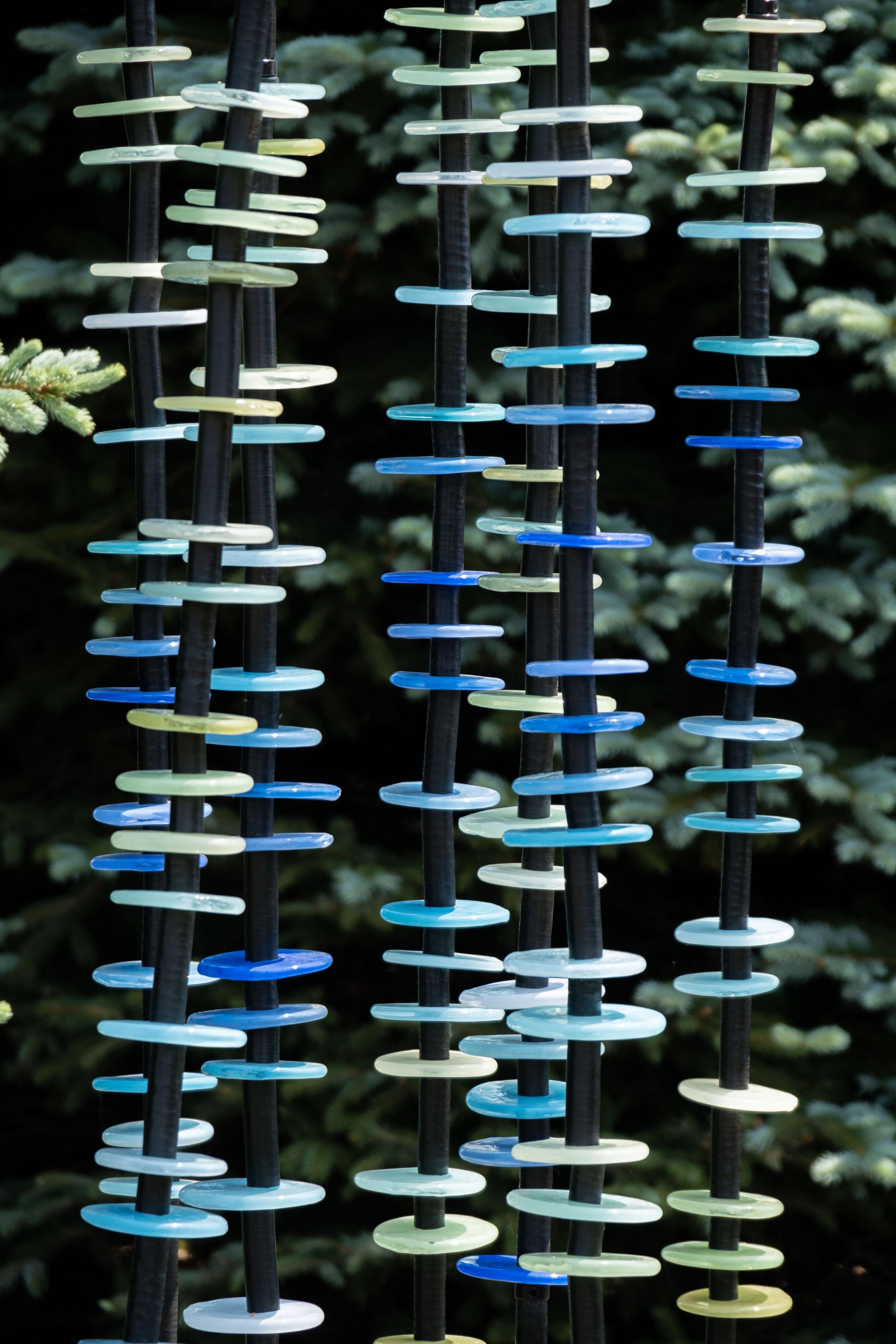 Susan Rankin has captured the luminous colour of water—from pale blue and turquoise to ocean blue in her latest series of garden columns. These hand-blown glass outdoor sculptures are inspired by nature’s palette and form. Each of seven steel