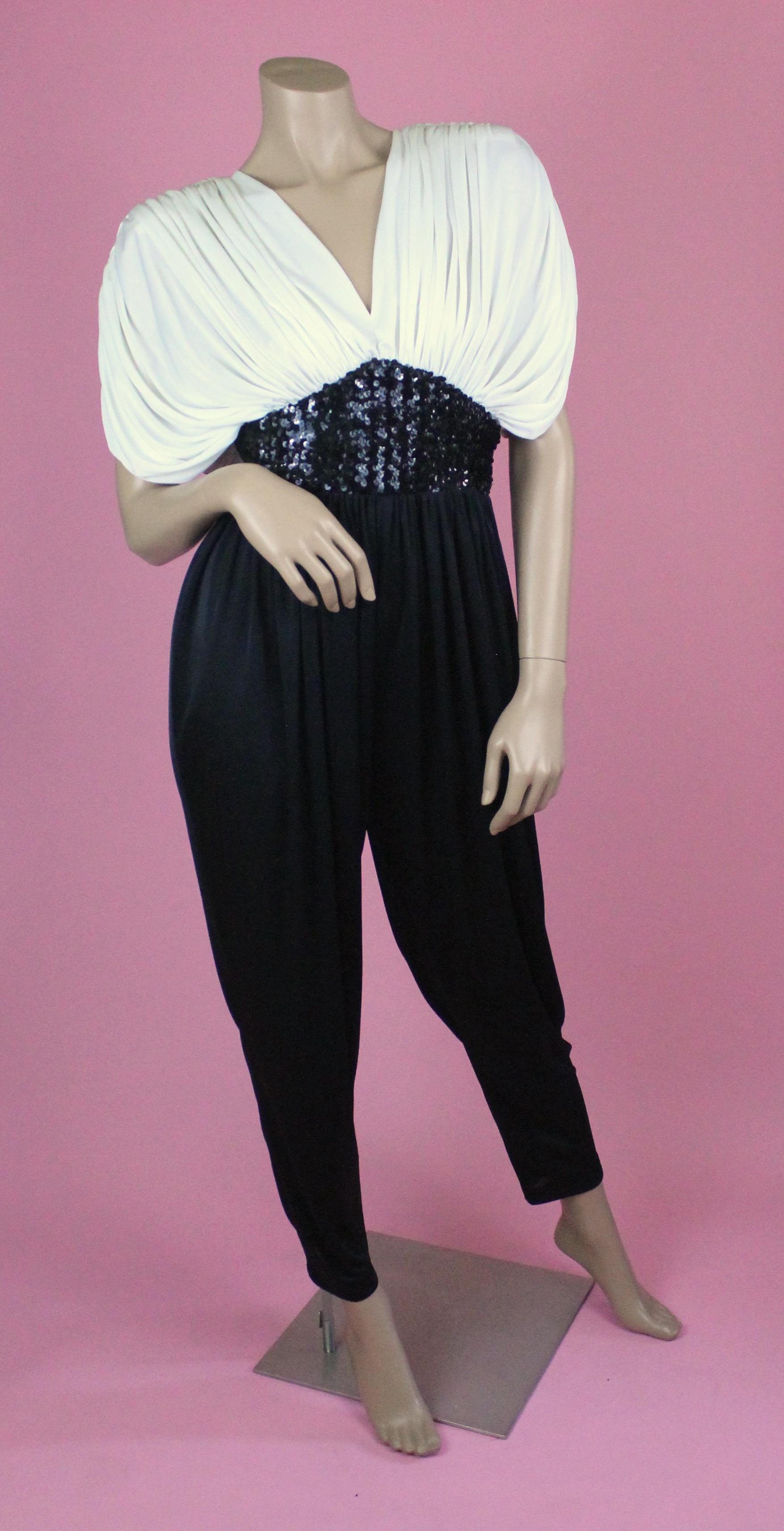 Susan Roselli for Vijack Jumpsuit
-Absolutely gorgeous 80's jumpsuit with draped top detailing (has shoulder pads)
-Midriff section is covered in sequined, zips at the back
-Bottom part billows at the hip and is drop crotch 