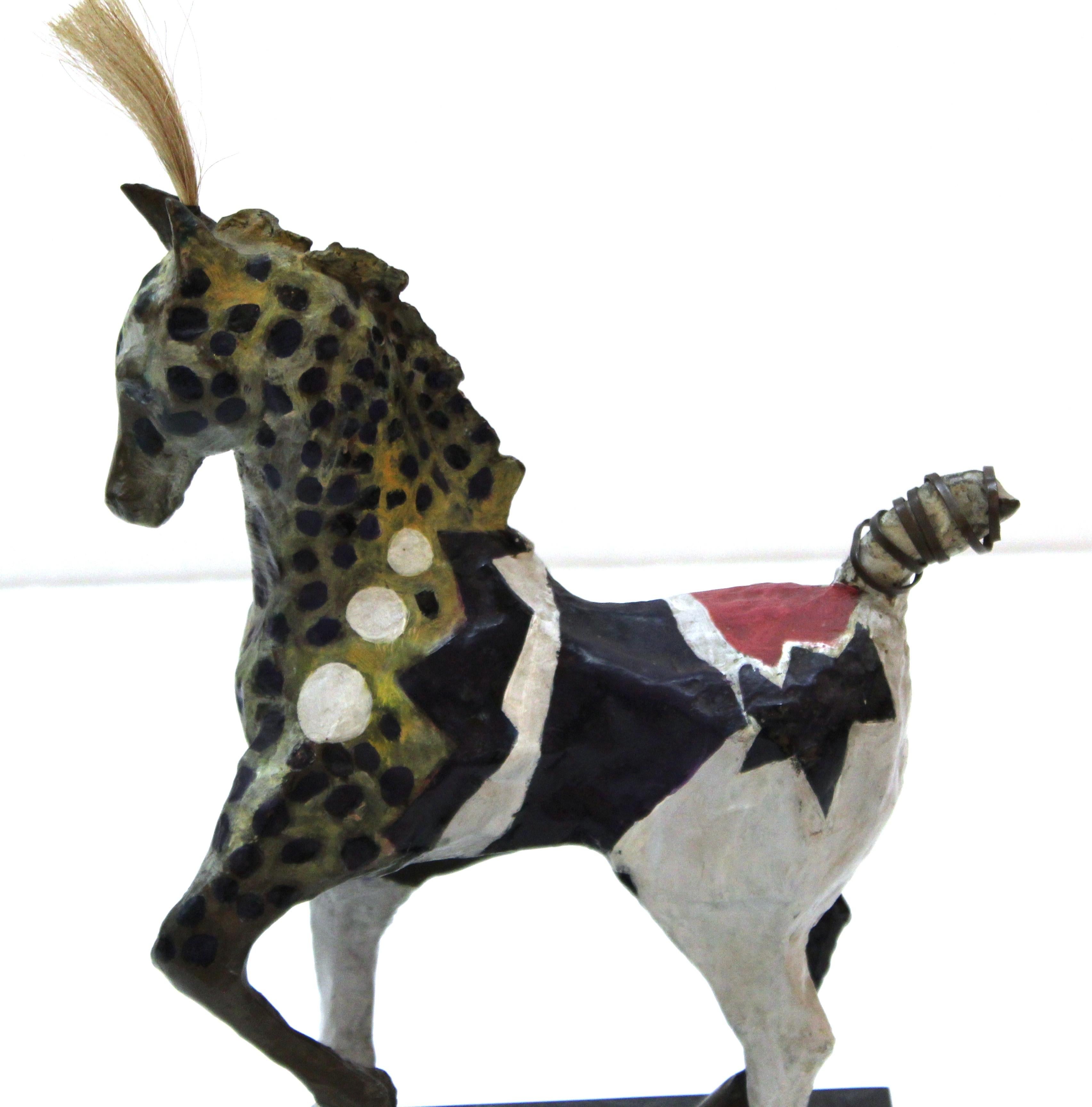 Modern painted bronze horse sculpture made by Susan Rowland (American, b. 1940). The horse has horsetail hair on its head and metal added to its tail (likely originally also holding horsehair) and colorful cold-painted finish. Signed on the bottom