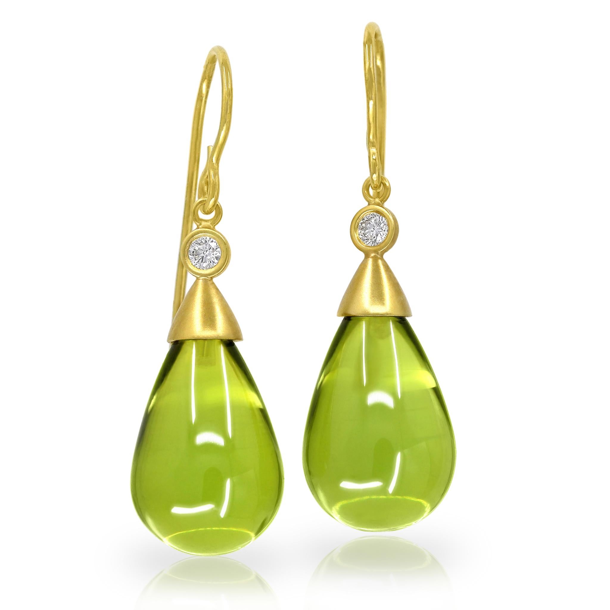 One-of-a-Kind Drop Earrings handcrafted by jewelry maker Susan Sadler featuring a gorgeous matched pair of smooth green amber cabochons set in matte and satin-finished 18.5k yellow gold with two bezel-set round brilliant-cut F/vs1 white diamonds
