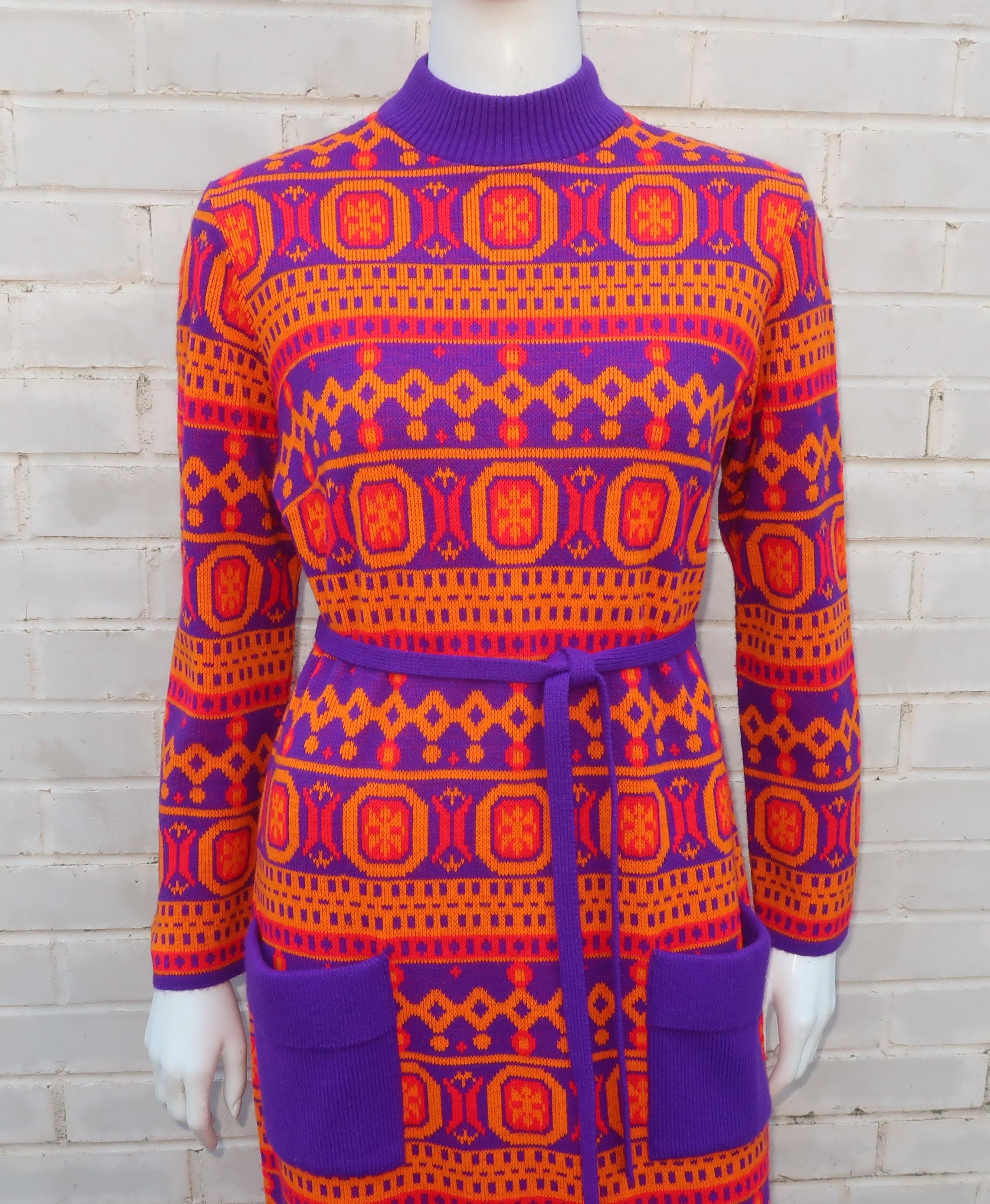 1970's Susan Small maxi sweater dress with a mod geometric motif in a vibrant color combination of red, orange and purple.  Susan Small was a British ready-to-wear clothing line opened in the 1940's with a reputation for party dress designs.  By the