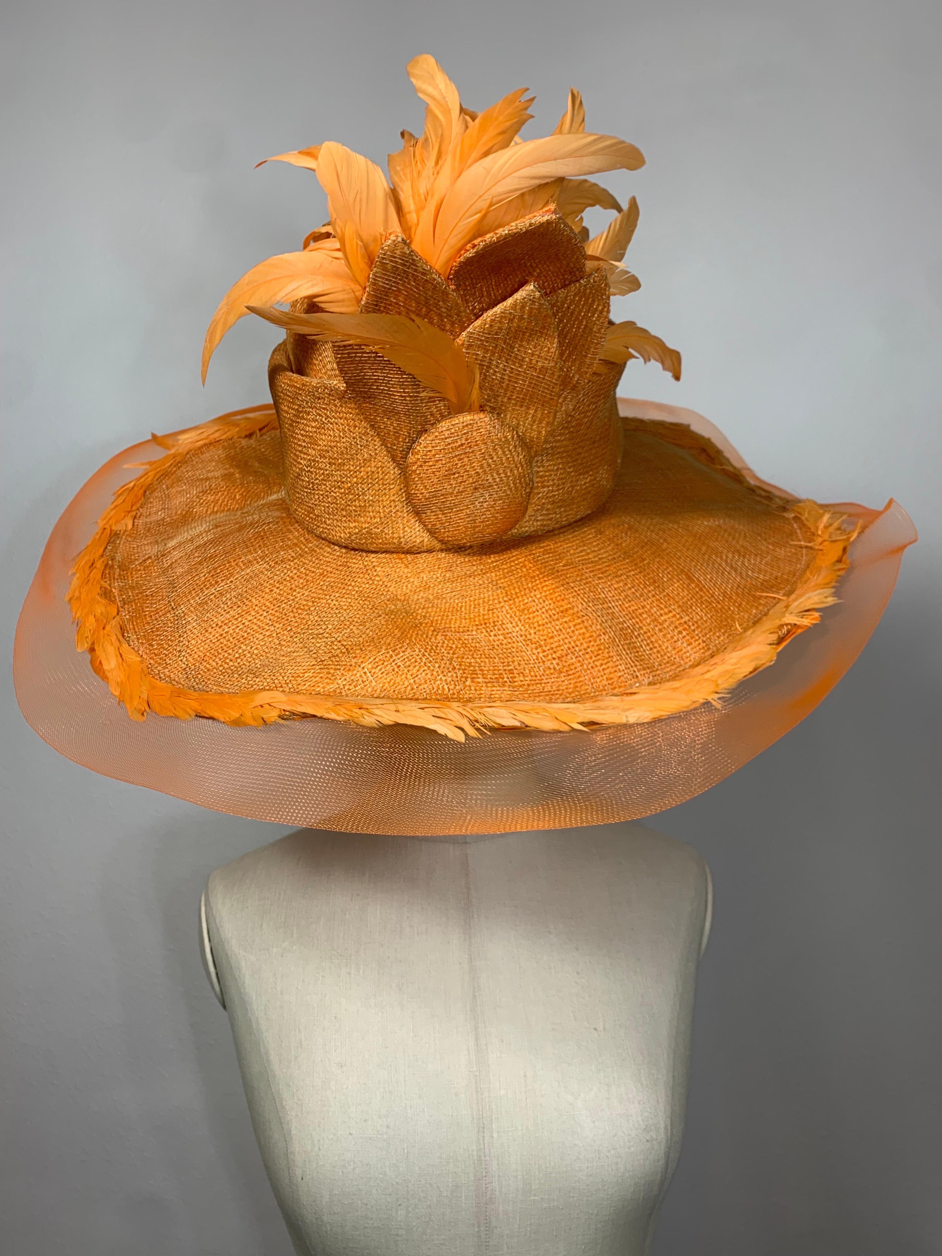 Susan van der Linde Orange Wide-Brim Straw Hat w Sheer Horsehair Rim & Feathers at Crown:  Rounded high crown is banded with a rosette of straw leaves and beautiful orange cream color coque feathers. Wide brim is edged in coordinating horsehair