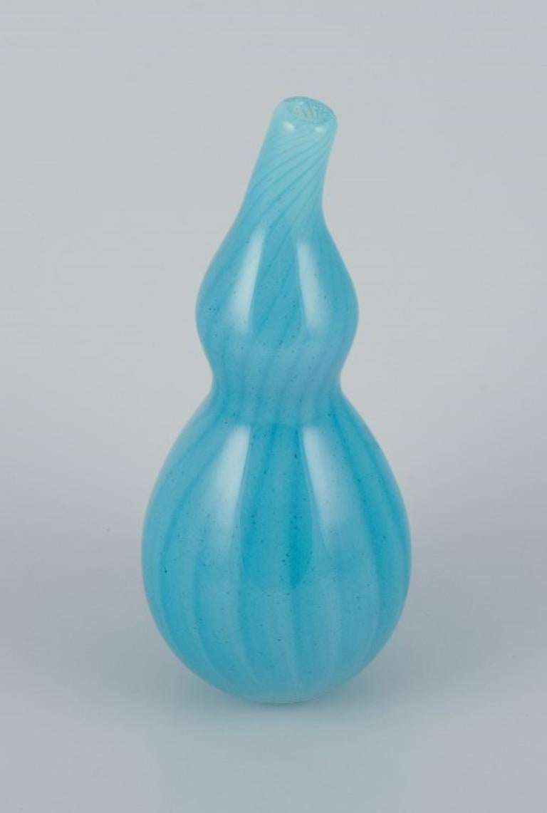 Susanne Allberg for Kosta Boda, Sweden.
Unique art glass vase in an organic shape in turquoise glass.
1980s/1990s.
Signed.
Model number 49841.
Excellent condition.
Dimensions: H 25.0 cm x D 10.0 cm.