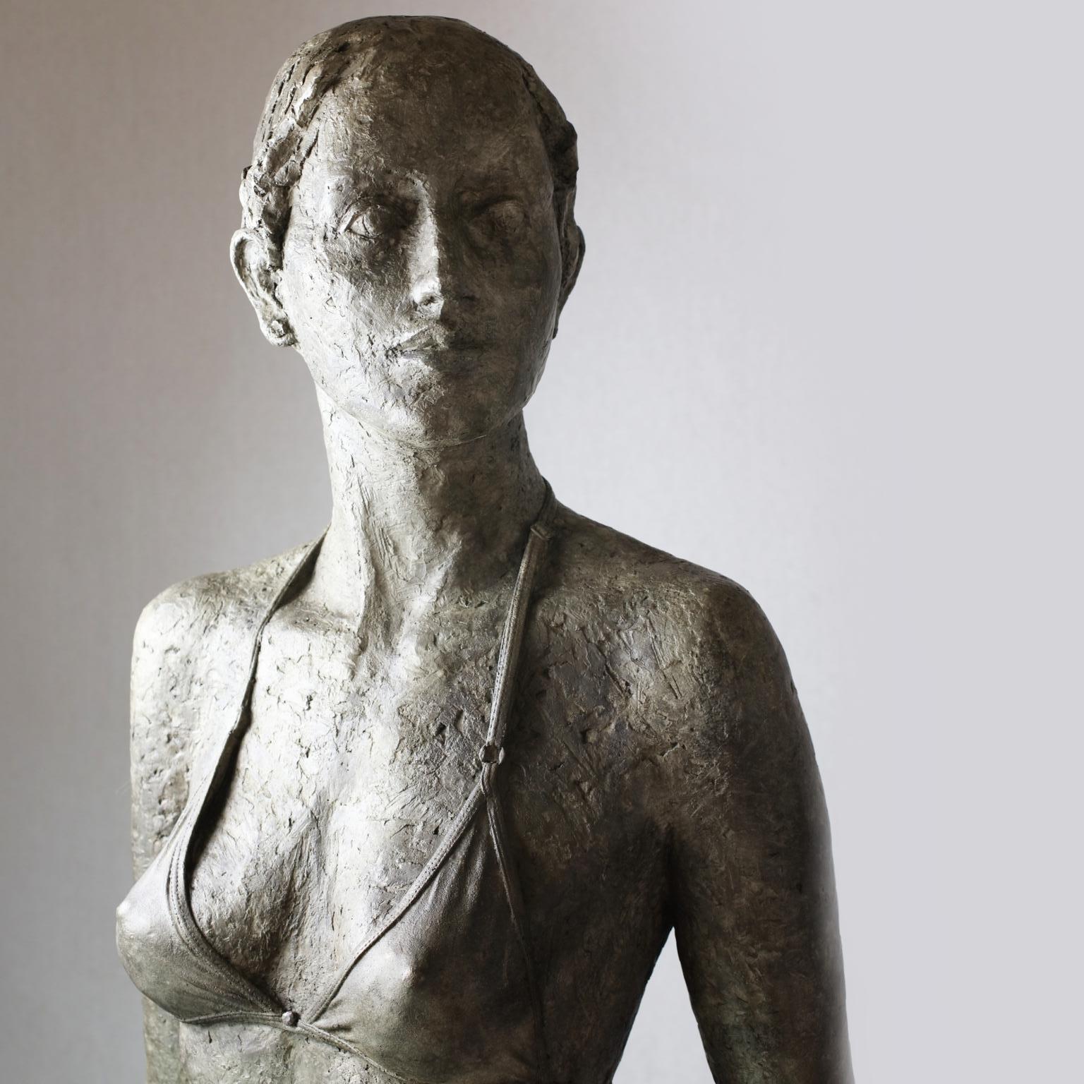 walking woman sculpture