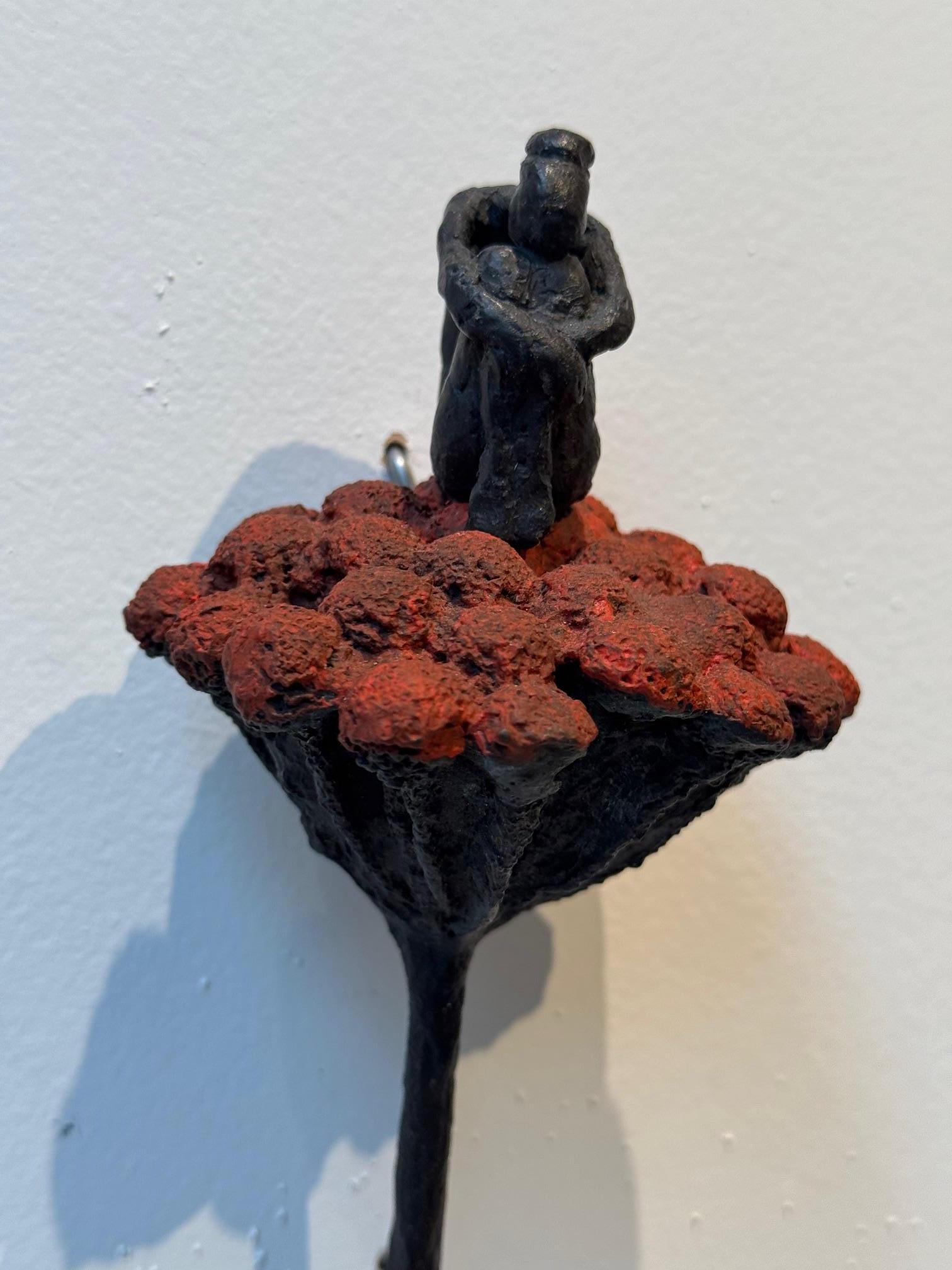 Flora - contemporary bronze wall sculpture of sitting female on red flower stem - Gold Figurative Sculpture by Susanne Kraisser