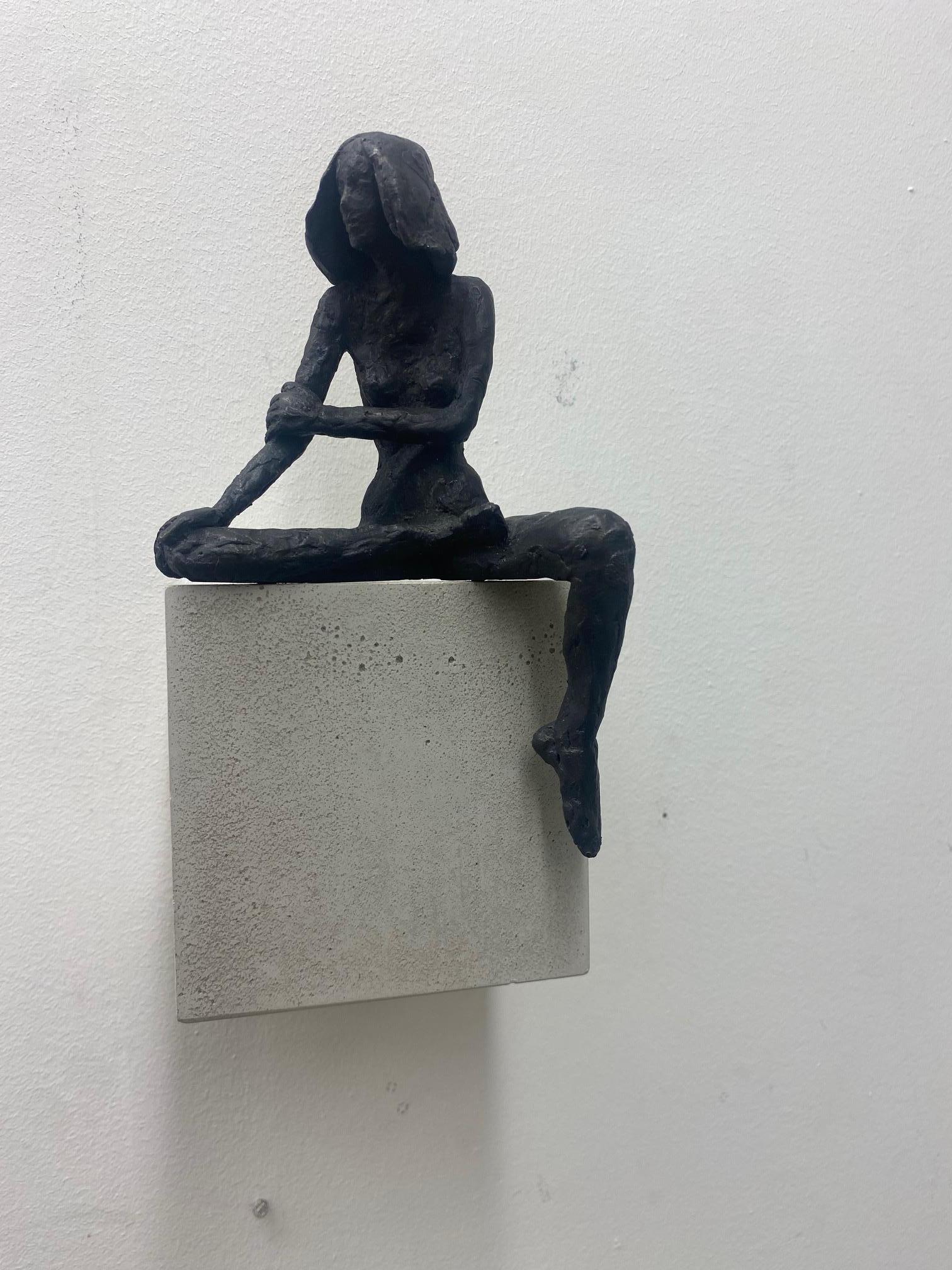 Girl Sitting XIV - contemporary bronze sculpture of nude female on wooden block - Sculpture by Susanne Kraisser