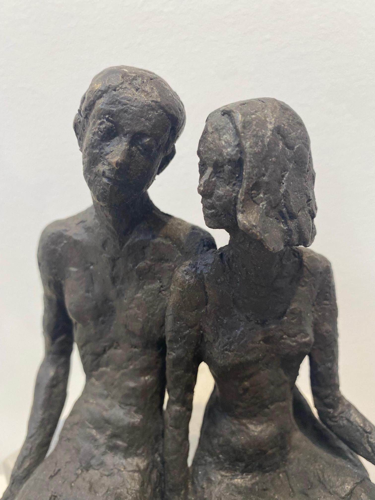 Pair  - contemporary bronze sculpture of a seated couple on a wooden block - Sculpture by Susanne Kraisser