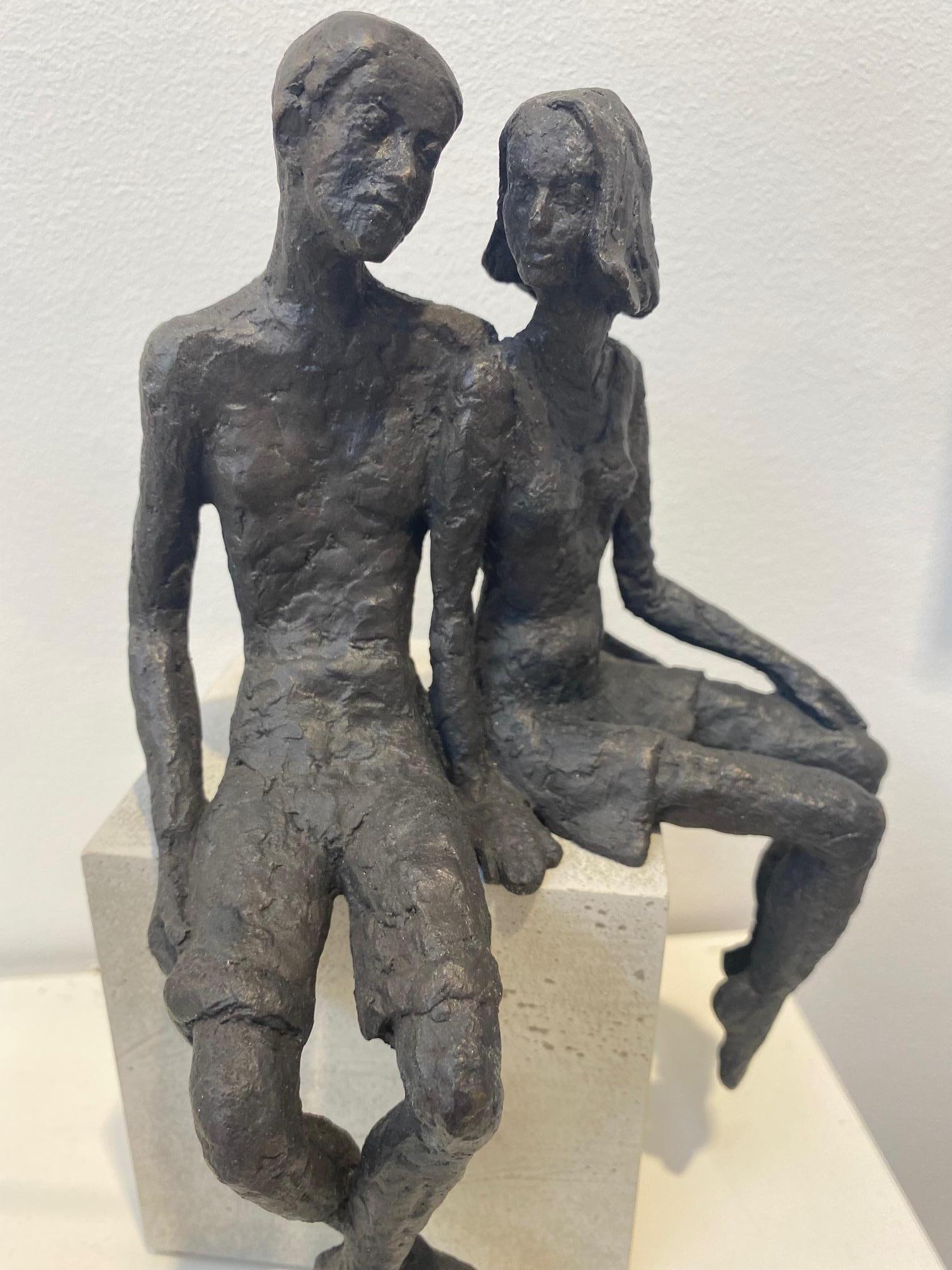 Pair  - contemporary bronze sculpture of a seated couple on a wooden block - Contemporary Sculpture by Susanne Kraisser