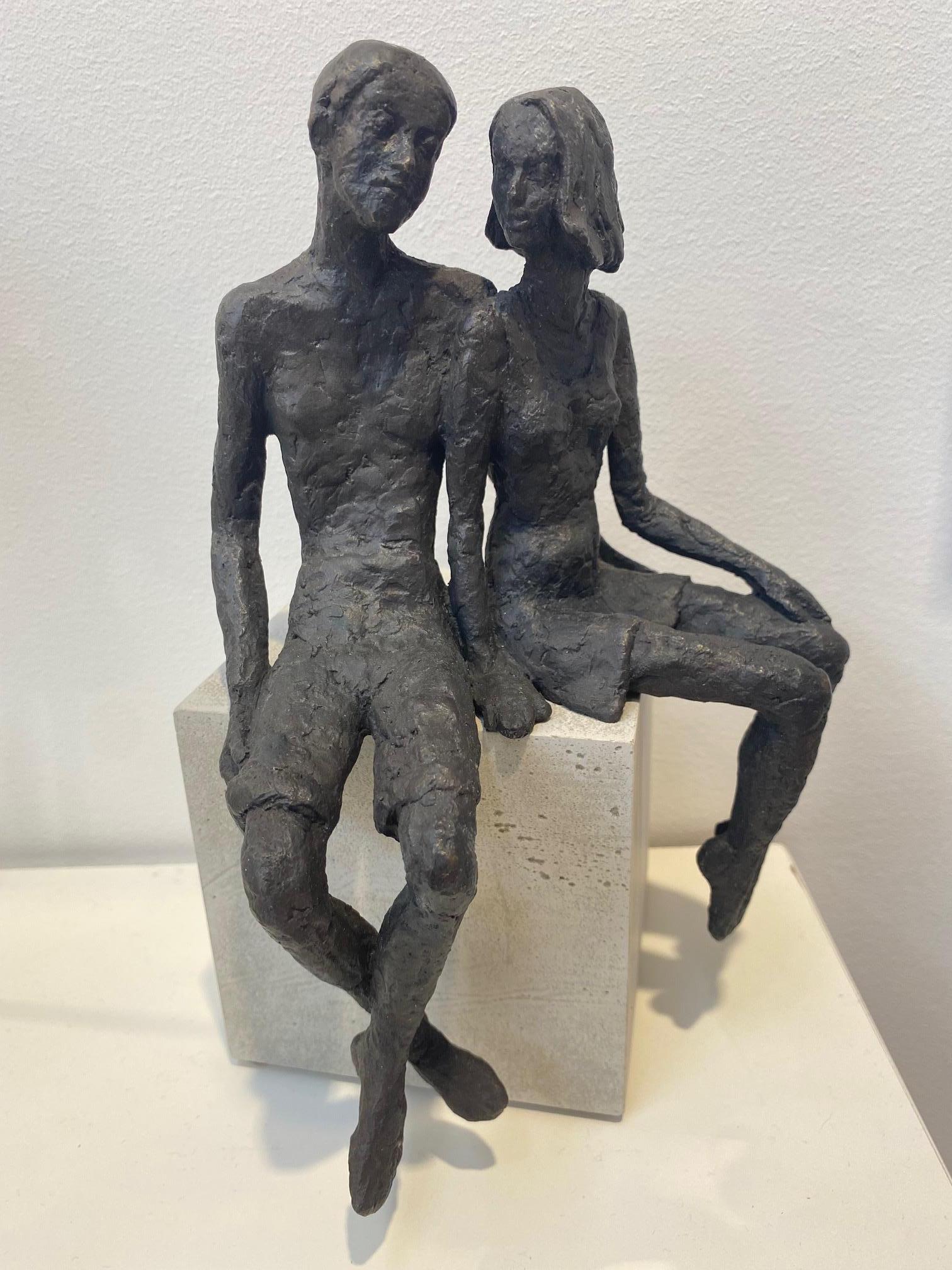 Pair  - contemporary bronze sculpture of a seated couple on a wooden block - Brown Figurative Sculpture by Susanne Kraisser