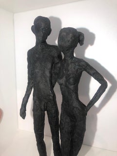 Two- contemporary minimalist bronze sculpture nude couple standing in wood-frame