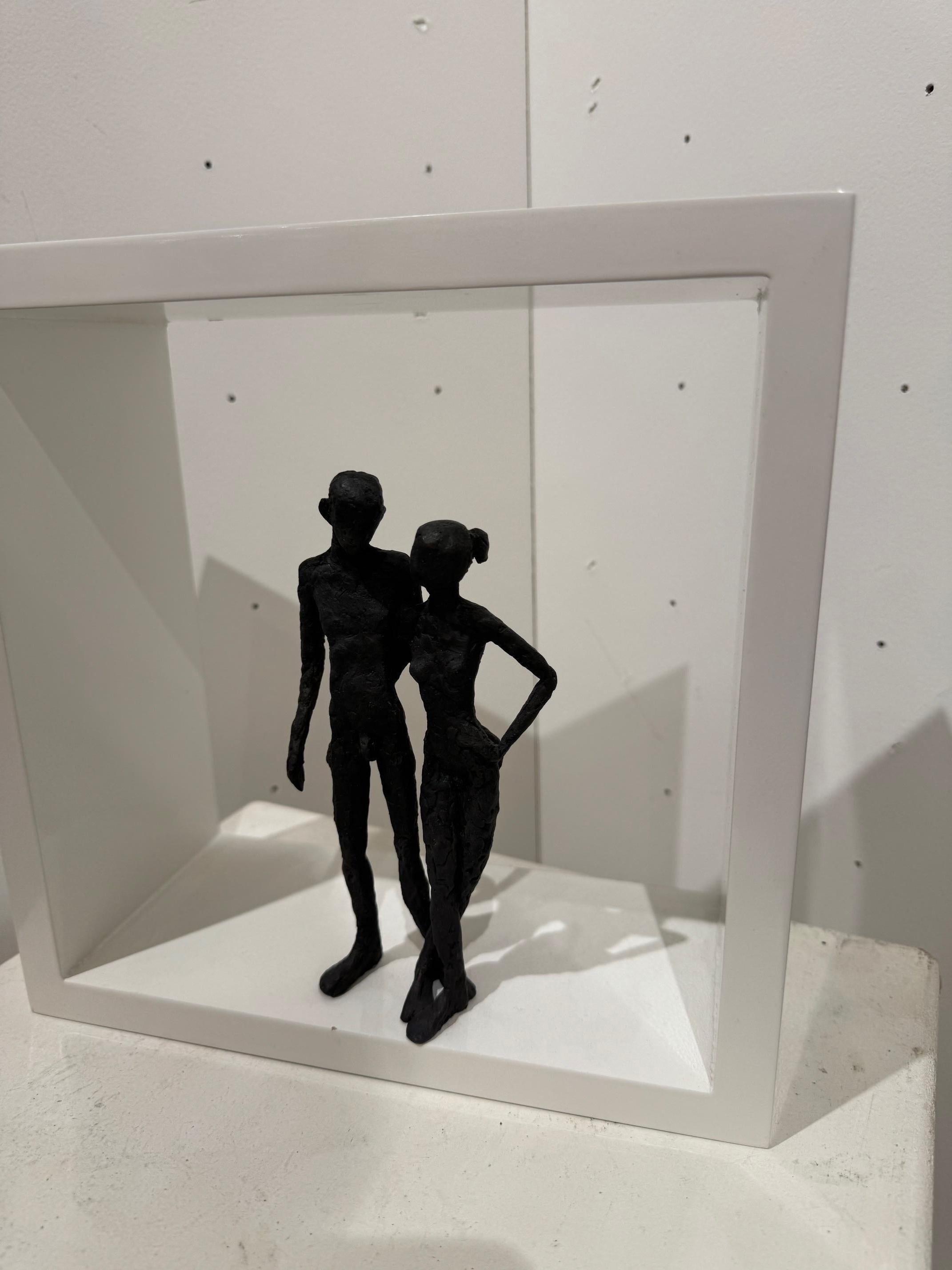 Two- contemporary minimalist bronze sculpture nude couple standing in wood-frame - Brown Figurative Sculpture by Susanne Kraisser