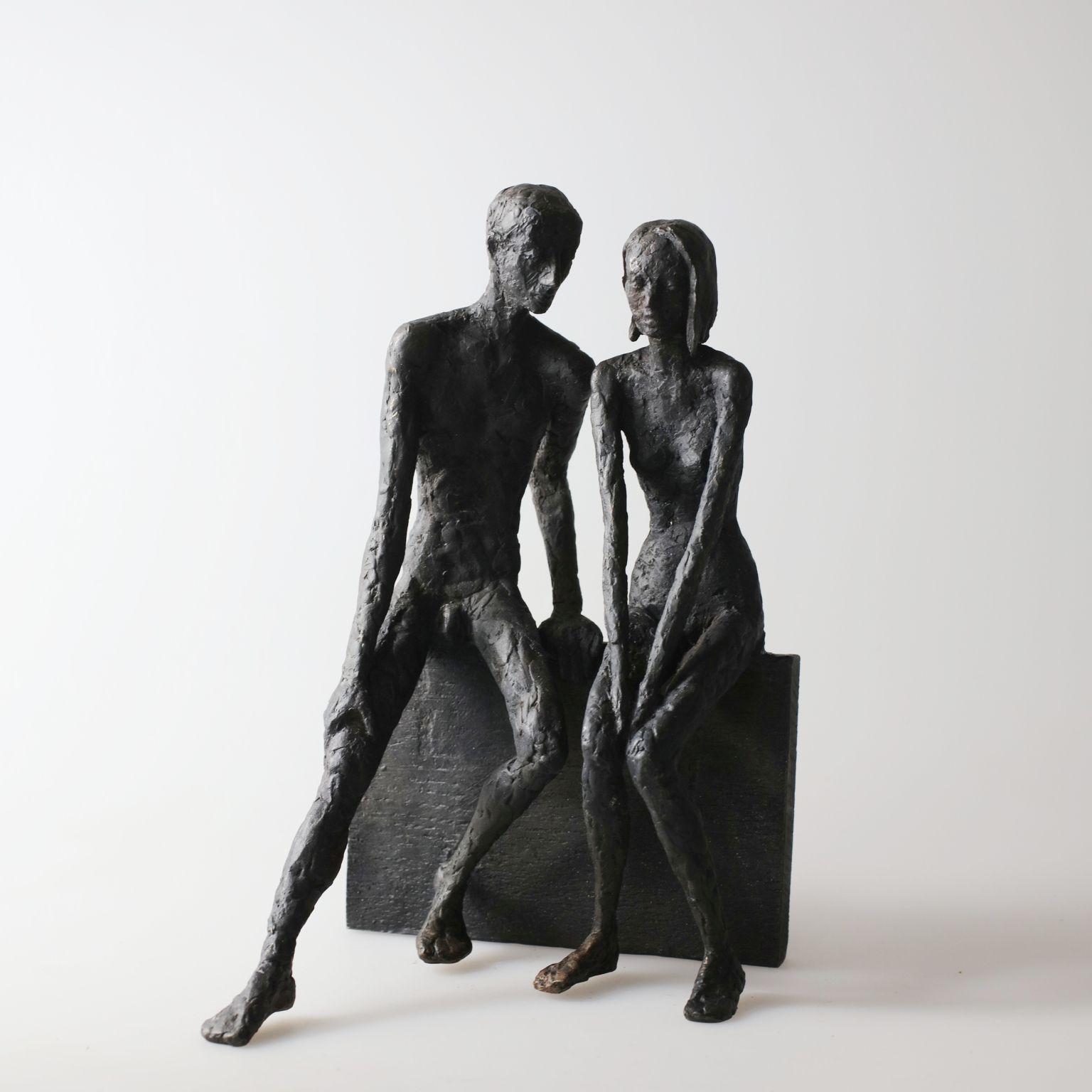 Unity - contemporary bronze sculpture of a nude couple sitting on a bronze block - Sculpture by Susanne Kraisser