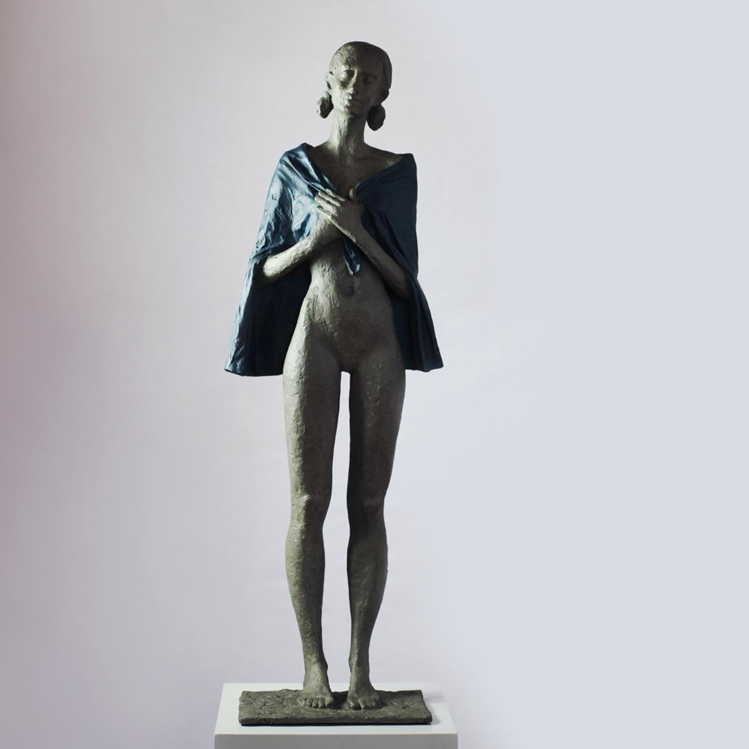 Susanne Kraisser Figurative Sculpture - Woman with Blue Cape (Day after Christmas) - contemporary bronze sculpture 