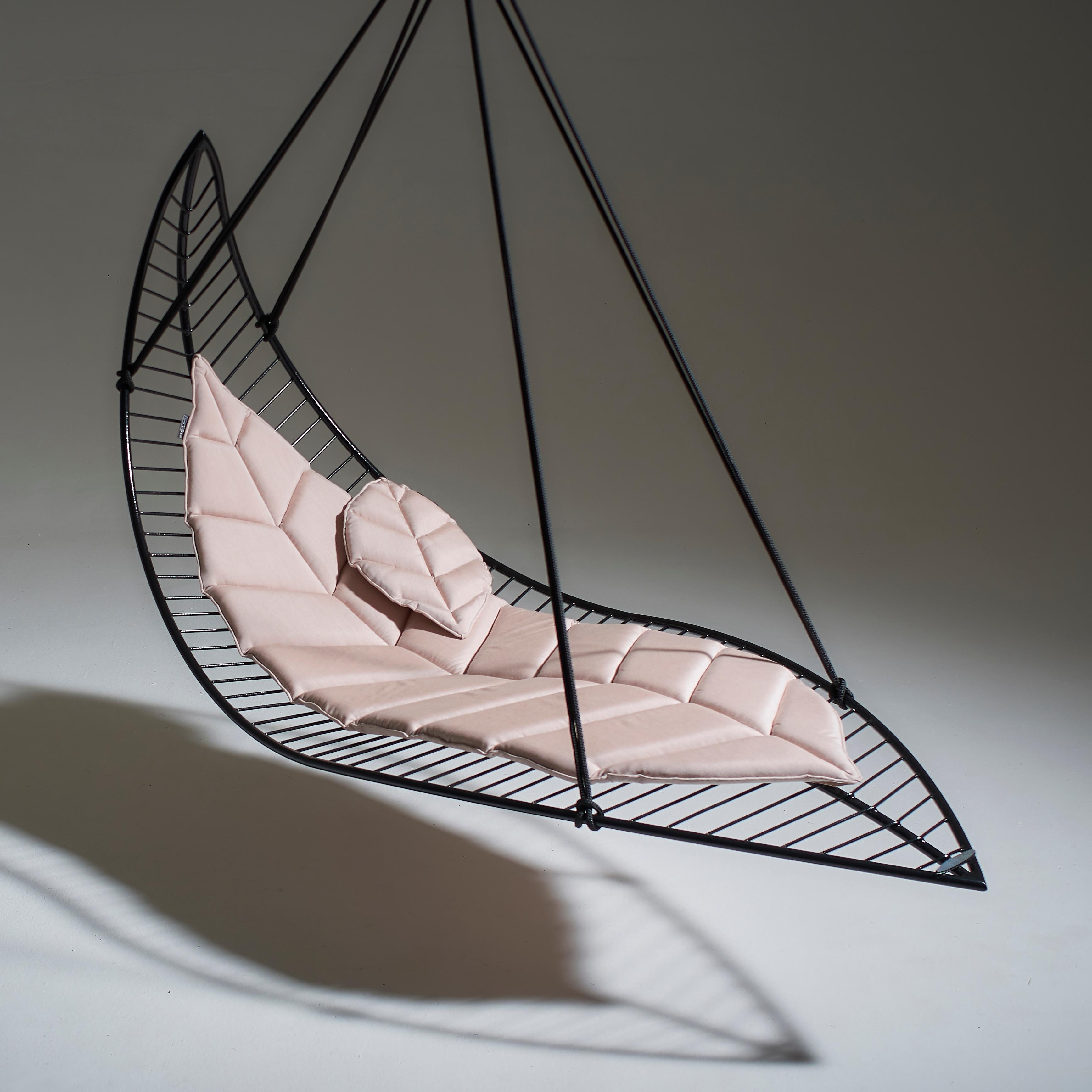 The Leaf hanging swing chair is fluid and organic. The chair is inspired by nature and is reminiscent of organic leaf shapes with its veins flowing out from the centre. It is simple and striking in its visual appeal.

The chair has been designed