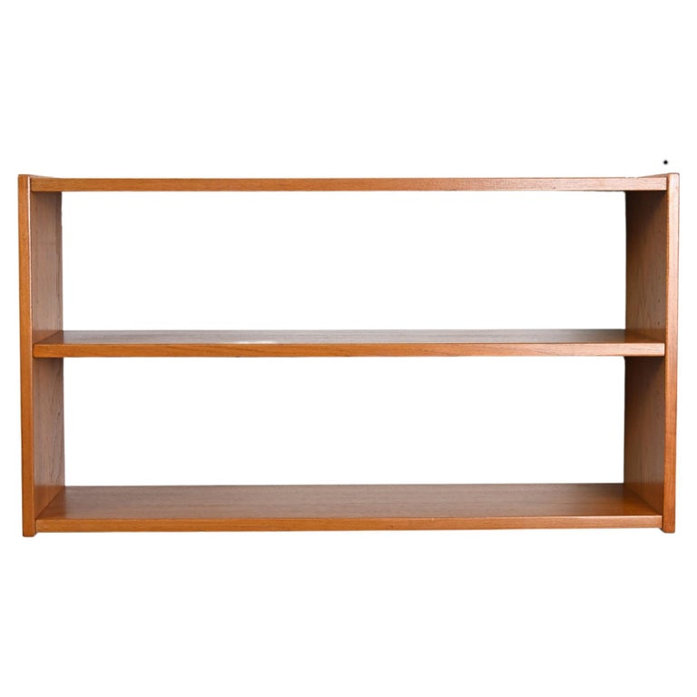 Suspended teak wood bookcase For Sale at 1stDibs