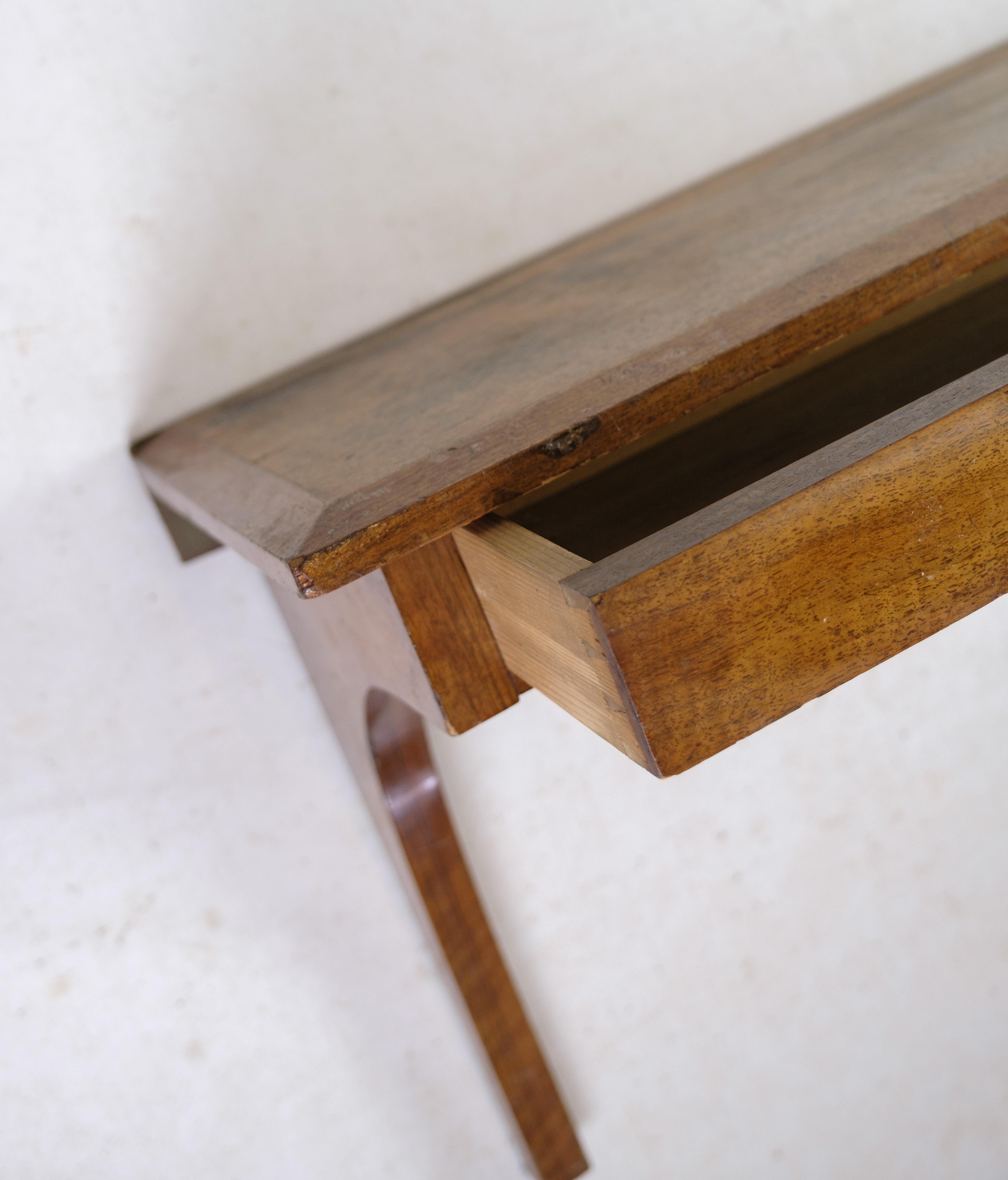 Danish Suspended wall console with a Drawer in Walnut from the 1920