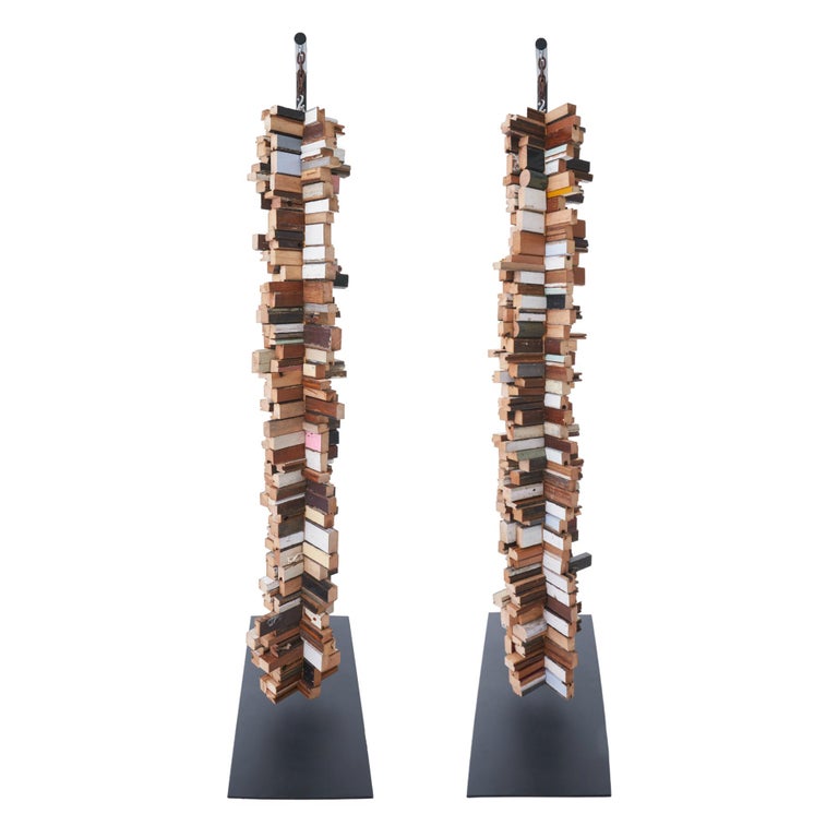 Suspended wood TOTEM from Chicago artist Michelle Peterson Albandoz. Constructed with fragments collected from old Chicago window sills and frames, the reclaimed wood dates back to the late 19th and early 20th centuries. The totems are suspended
