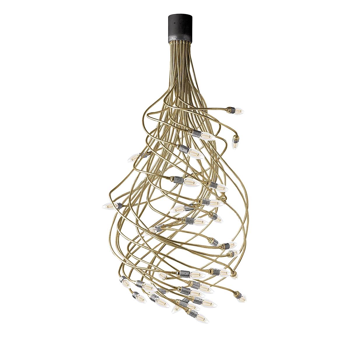 La serie Turciù, diseñada por Enzo Catellani, encarna la interacción, la creatividad y la libertad expresiva. Gracias a sus numerosos brazos flexibles, la lámpara puede moldearse y esculpirse a voluntad, creando una presencia luminosa única y