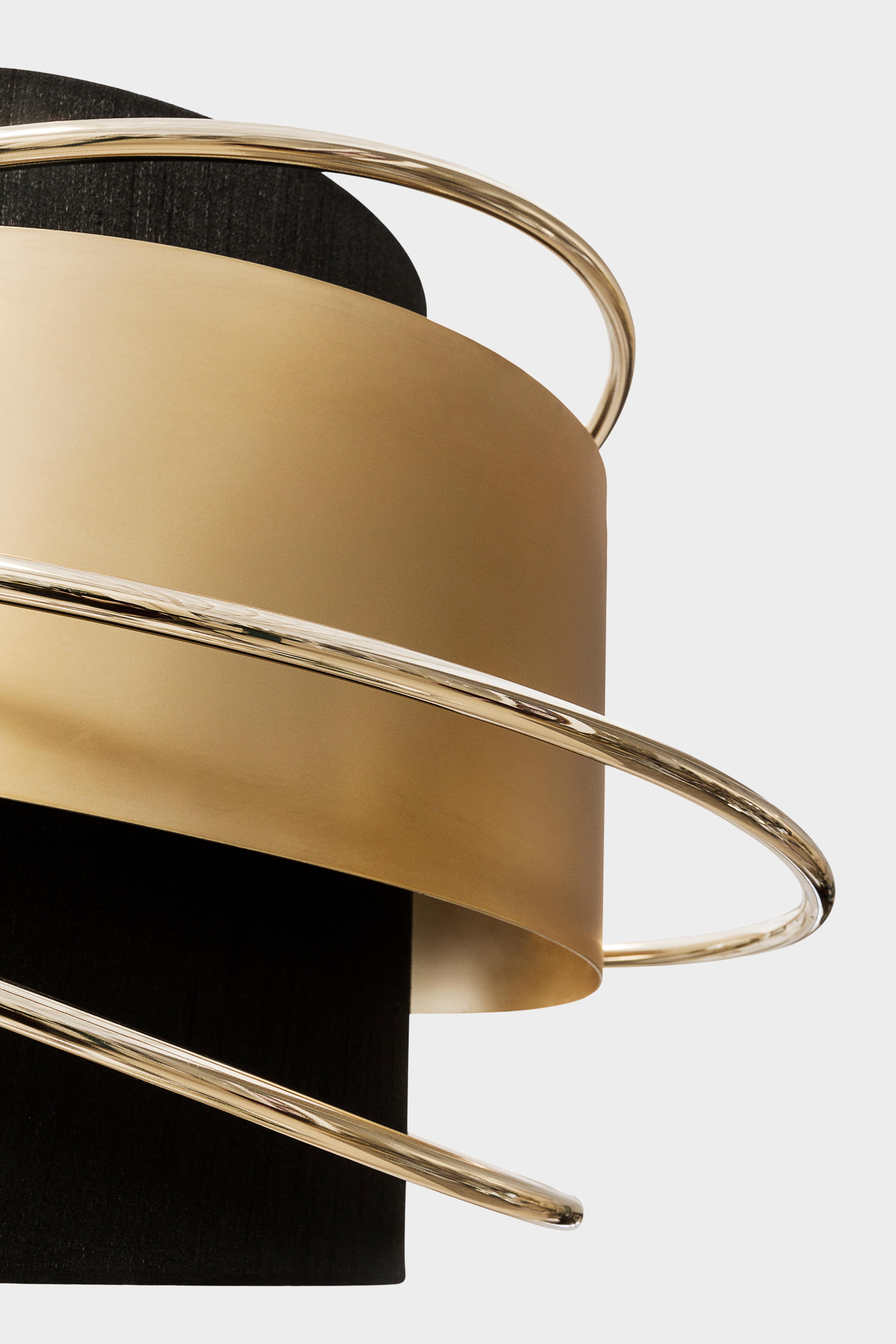Enlace suspension lamp, Modern Collection, Handcrafted in Portugal - Europe by GF Modern.

To entangle the right moments with the right company, Enlace becomes the center of the scenic location that we call a dining room. Made of polished brass