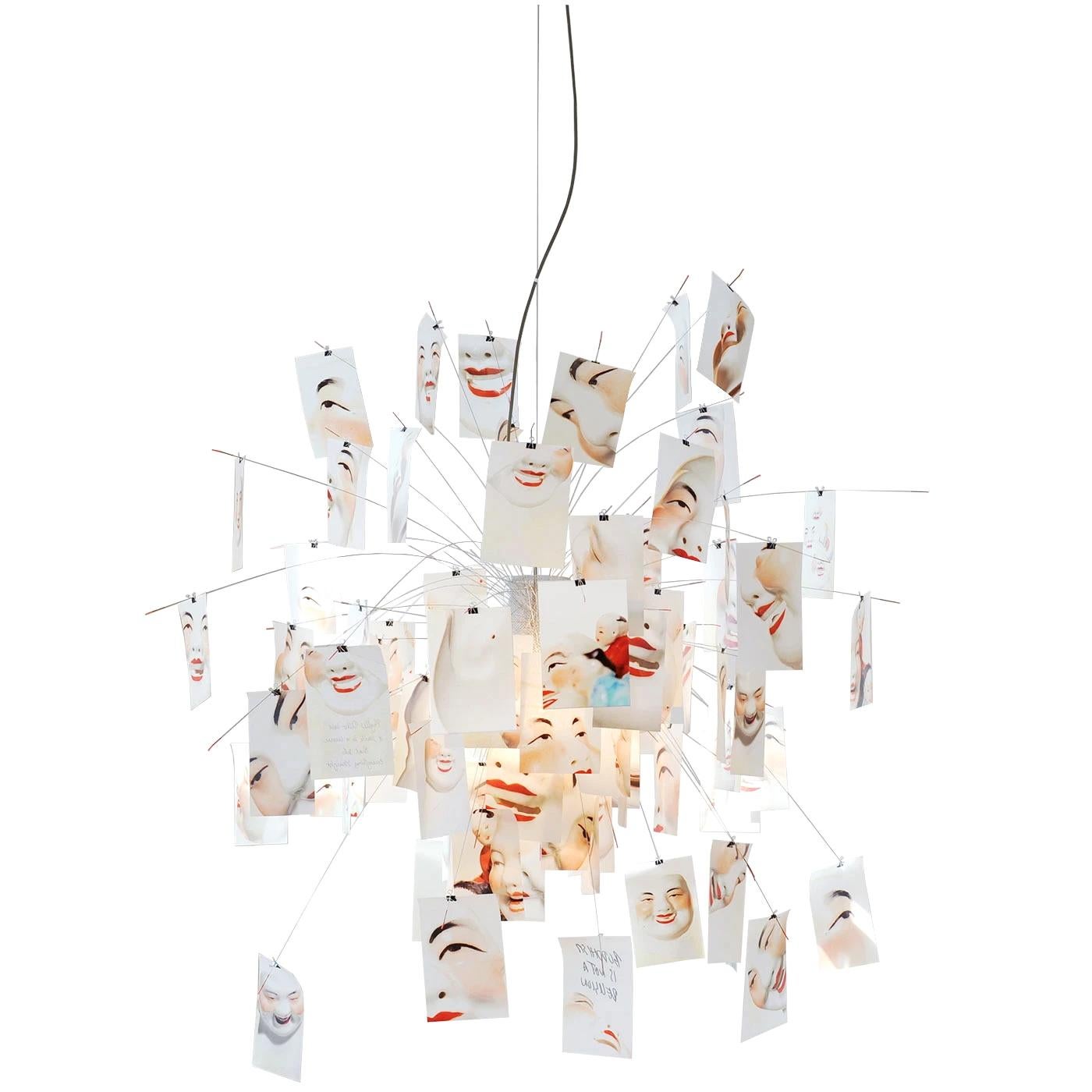 Model: Zettel'z Laughing Buddha
Designer: Ingo Maurer 
Team

Zettel'z Laughing Buddha reflects Ingo Maurer’s fascination with Chinese porcelain figures, previously used in a special edition of Porca Miseria! For this limited edition of 200