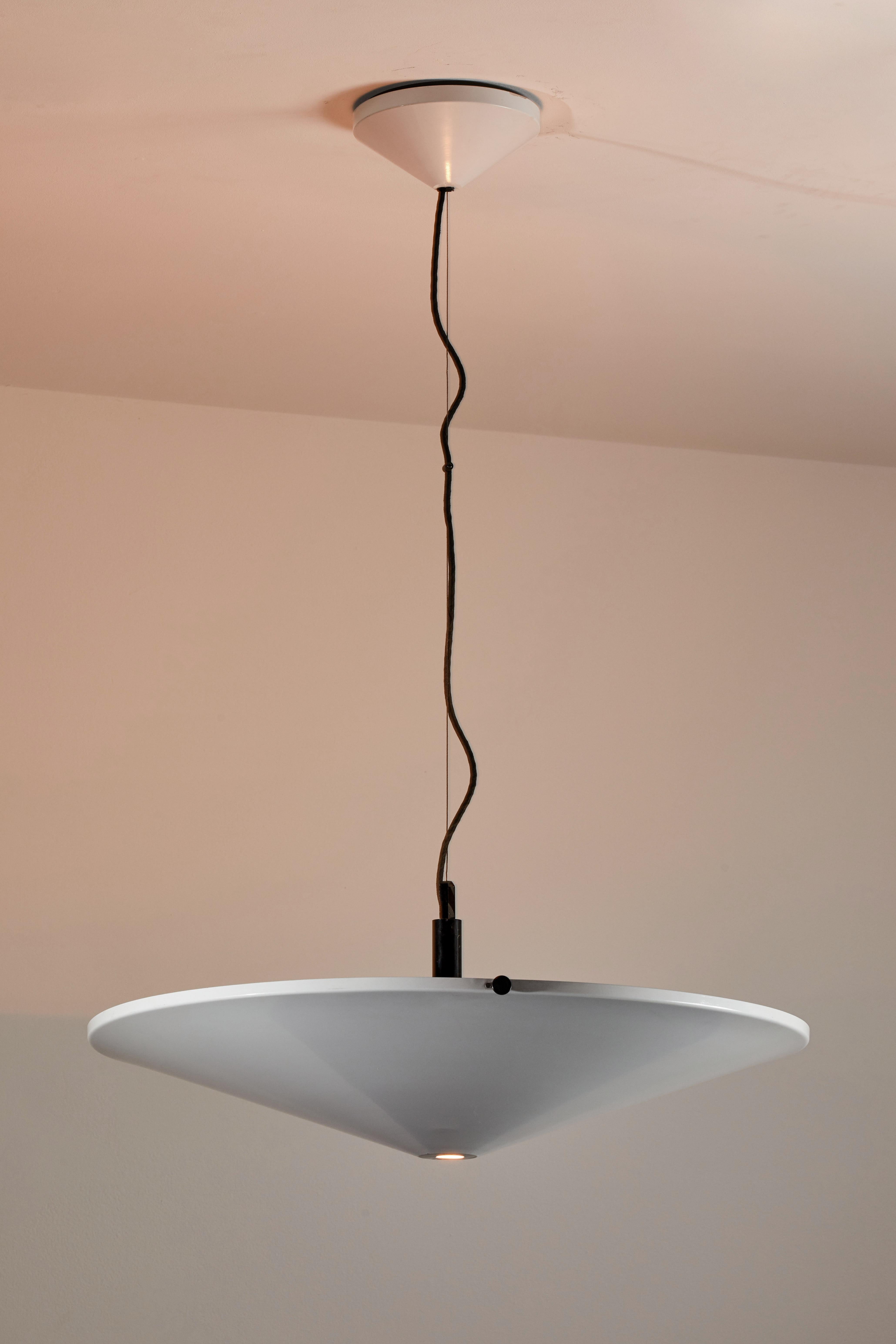 Suspension light by Arteluce. Manufactured in Italy, circa 1970s. Enameled metal. Rewired for U.S. junction boxes. Takes one Halogen 200w maximum bulb. Bulb provided as a one time courtesy.