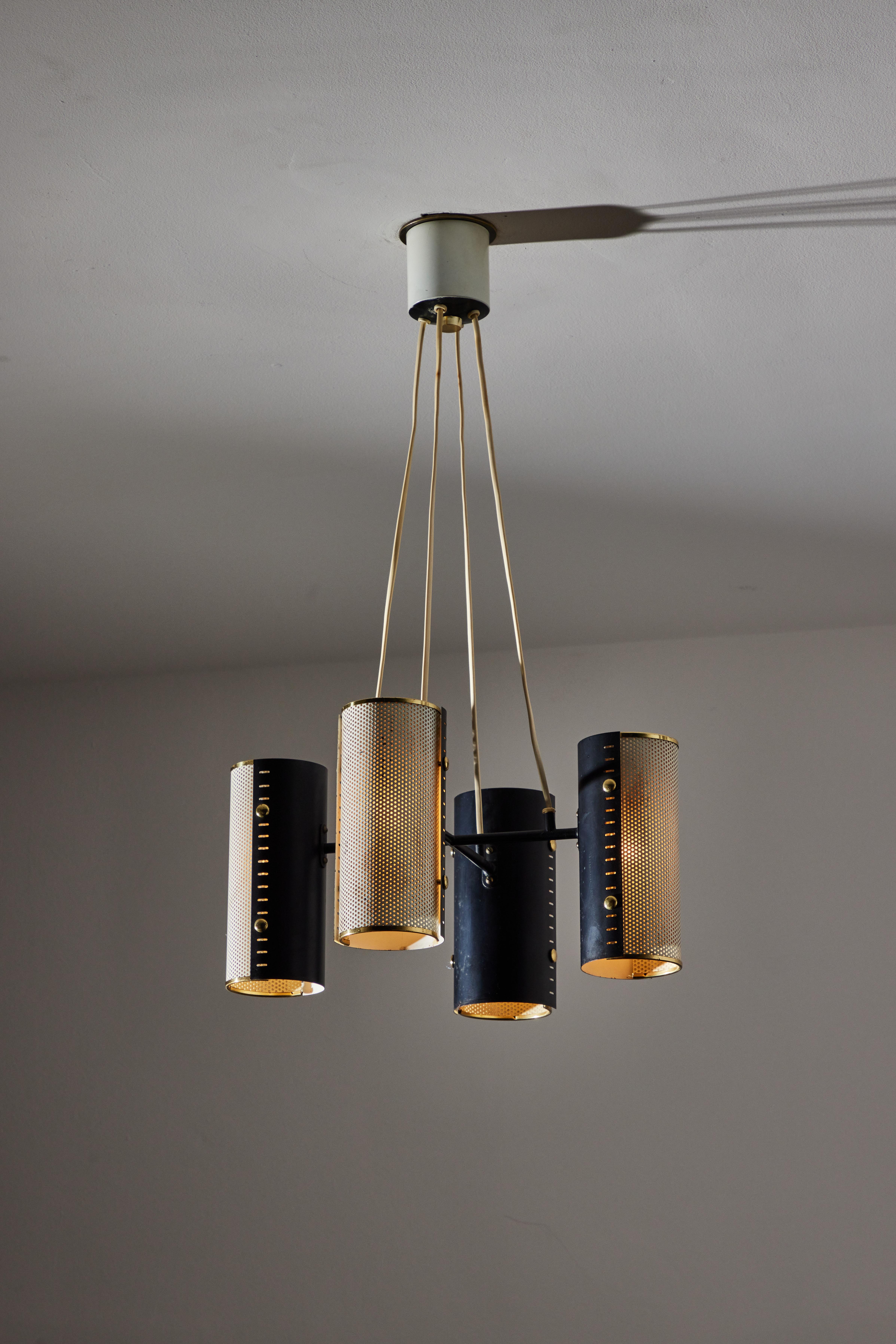 Suspension light by Borens. Manufactured in Sweden circa 1950's. Enameled metal, original canopy. Wired for U.S. standards. We recommend four E27 40w maximum bulbs. Bulbs not included.
Please note that this fixture has wear and is very distressed. 