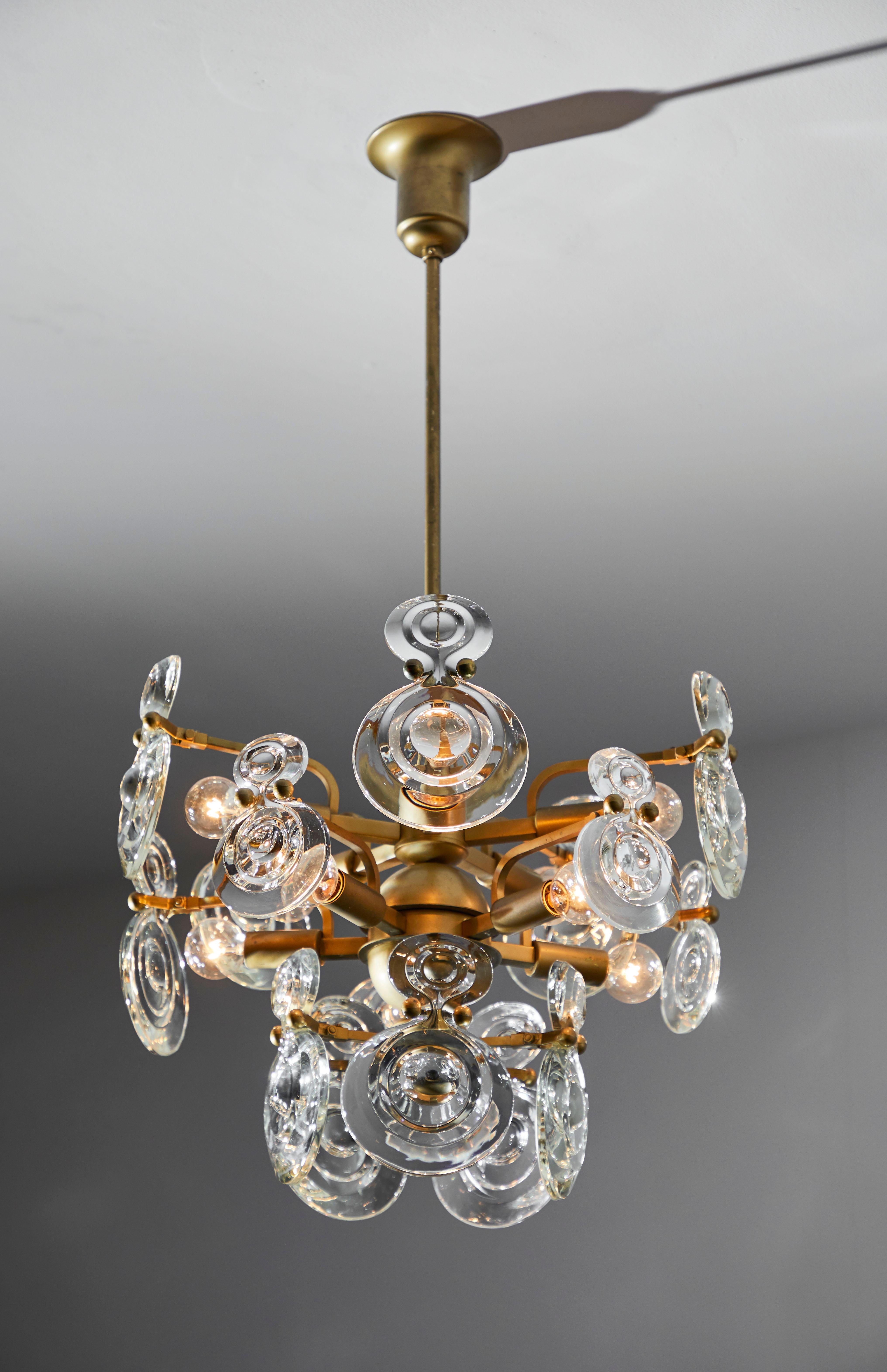 Suspension light by Gaetano Sciolari. Manufactured in Italy, circa 1960s. Brass, glass. Rewired for U.S. junction boxes. Original canopy, custom brass ceiling plate. Takes ten 40w maximum bulbs. Bulbs provided as a one time courtesy.