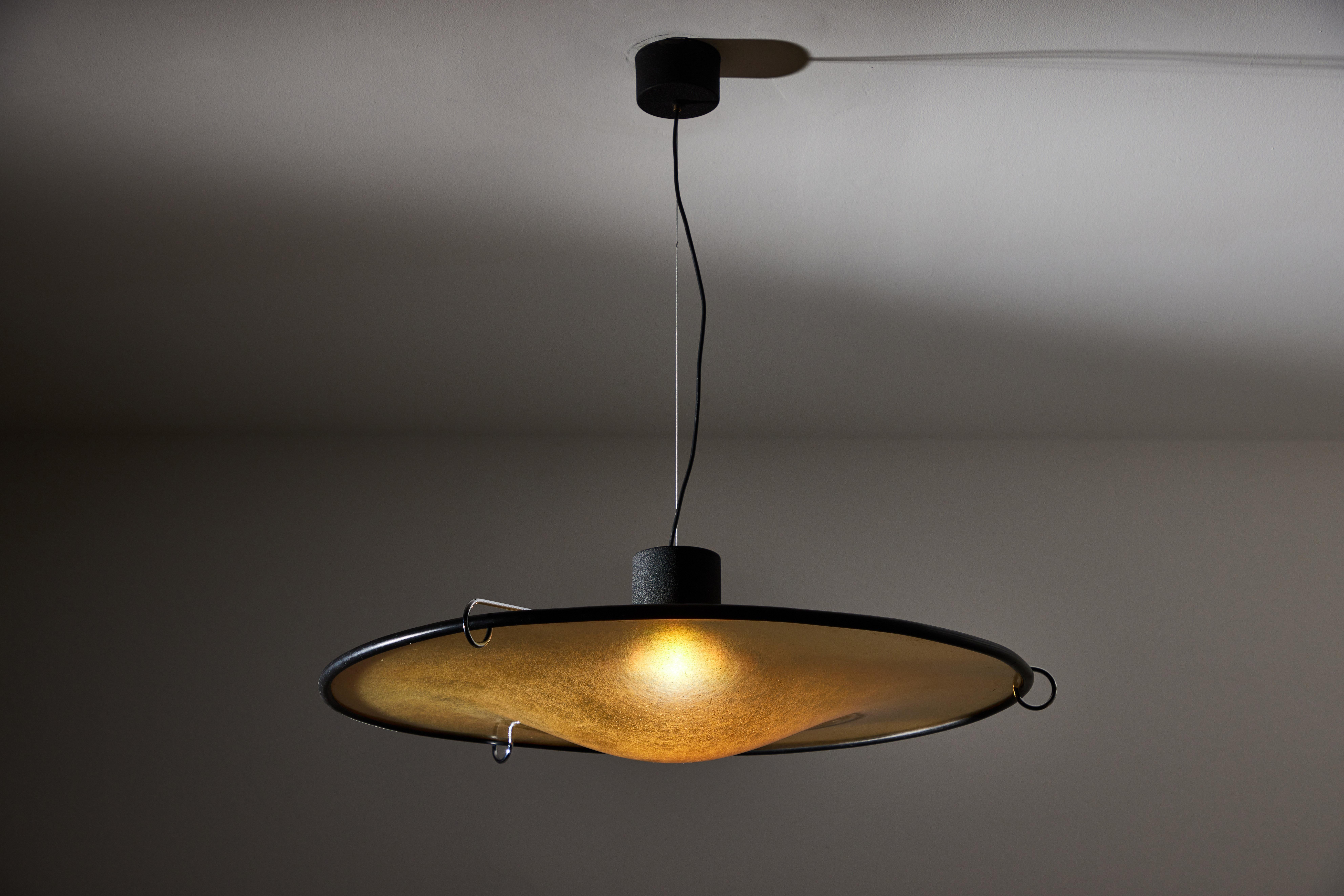 Suspension Light by Luci-Cinisello Balsamo. Designed and manufactured in Italy, circa 1970's. Fiberglass, rubber, metal. Custom backplate. Original canopy. Rewired for U.S. standards. We recommend one E27 100w maximum bulb. Bulb provided as a one