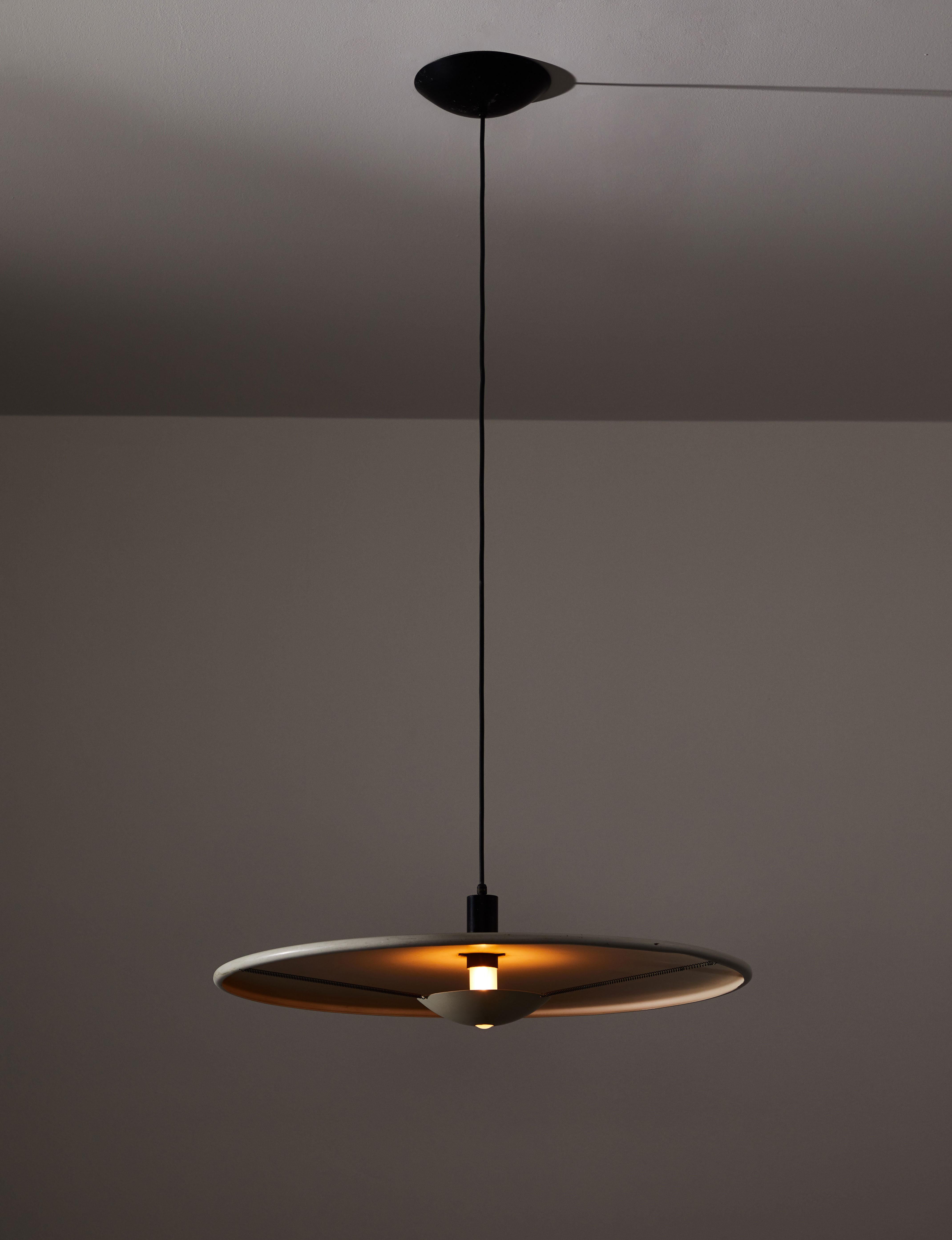 Minimalist suspension light by Marco Colombo and Mario Barbaglia. Designed and manufactured in Italy, circa 1980s. Enameled Aluminum. Rewired for US junction boxes. Original canopy. Takes one E26 75w maximum bulb. Bulbs provided as a one time