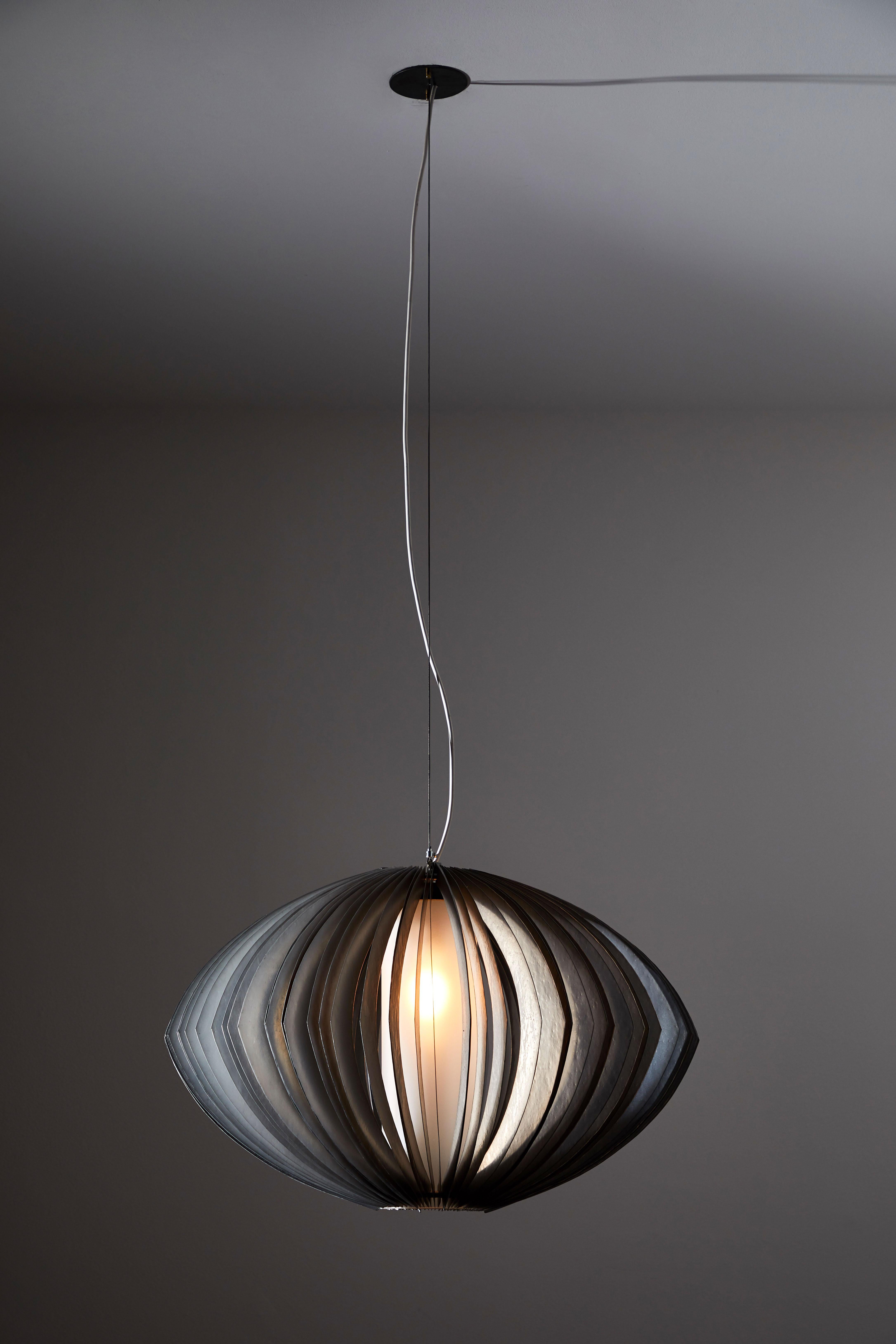 Suspension light by Paolo Rizzato. Designed and manufactured in Italy, circa 1970s. Metal, satin glass diffuser. Rewired for US junction boxes. Takes one E27 100w maximum bulb. Height displayed is for fixture only, overall drop can be adjusted.