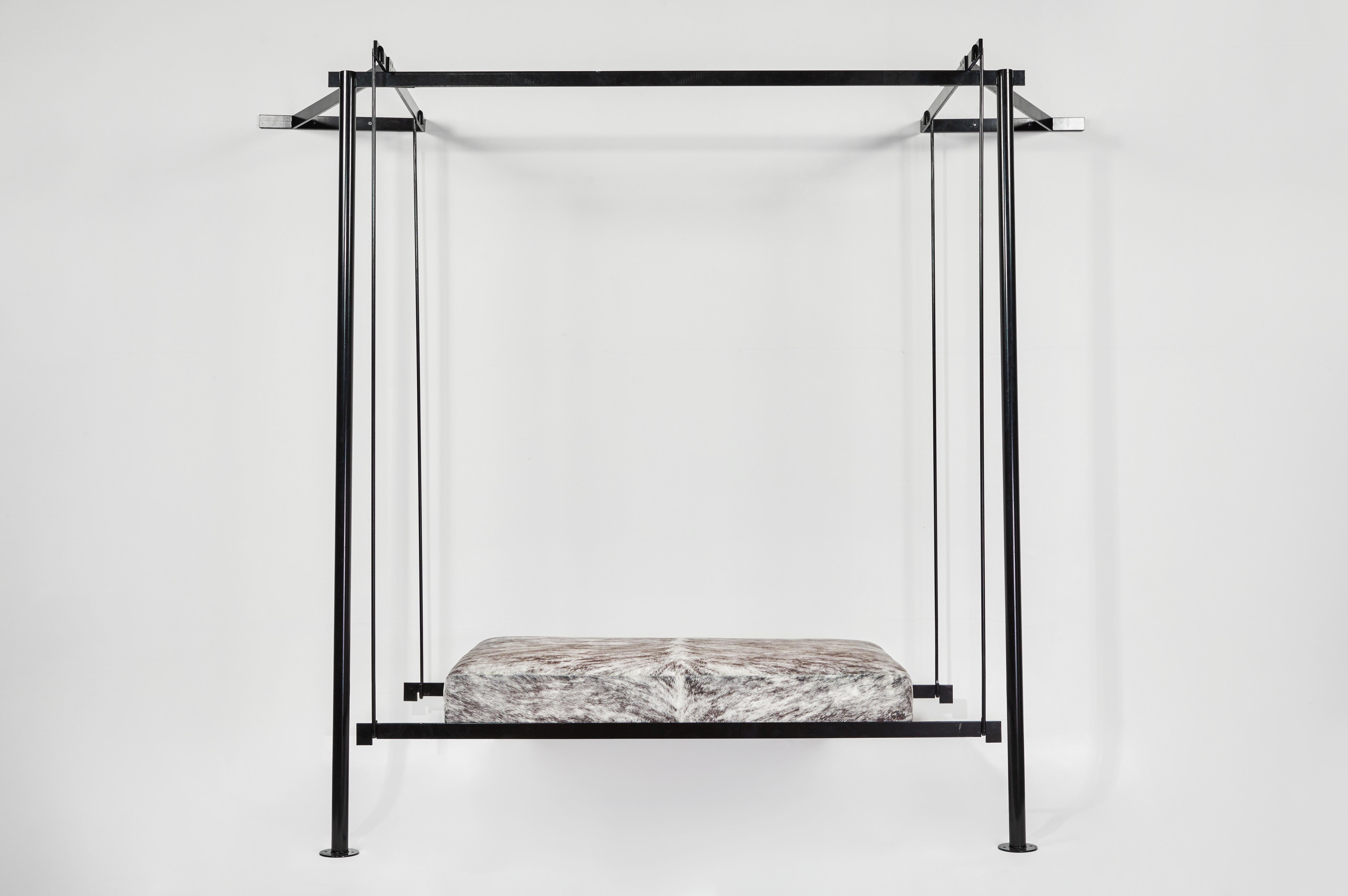 'Suspension' Seat in the Style of Pierre Chareau

Handcrafted in Los Angeles in the workshop of noted French designer and antiques dealer Denis de le Mesiere, who pays homage to the work of Pierre Chareau with scrupulous attention to detail and