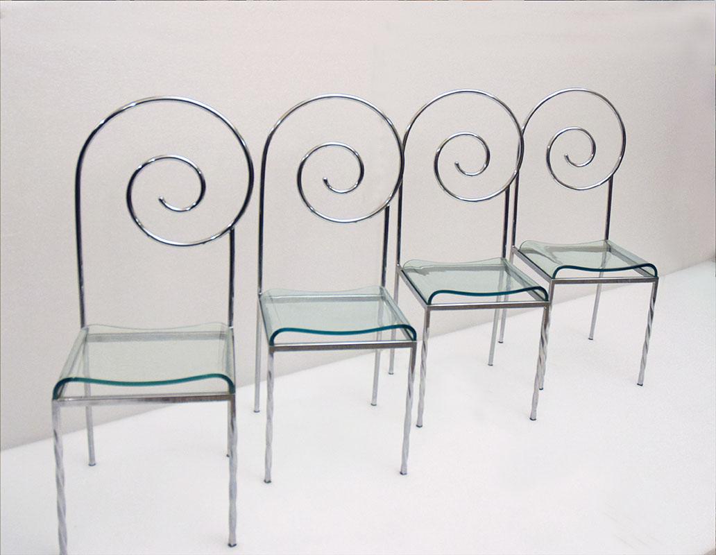 Set of 4 Suspiral chairs design Luigi Serafini for Sawaya & Moroni 1980s, no longer in production.
Chrome-plated steel frame with spiral back and twisted front legs, seat in curved glass.
Marked on the back.
In excellent conditions.