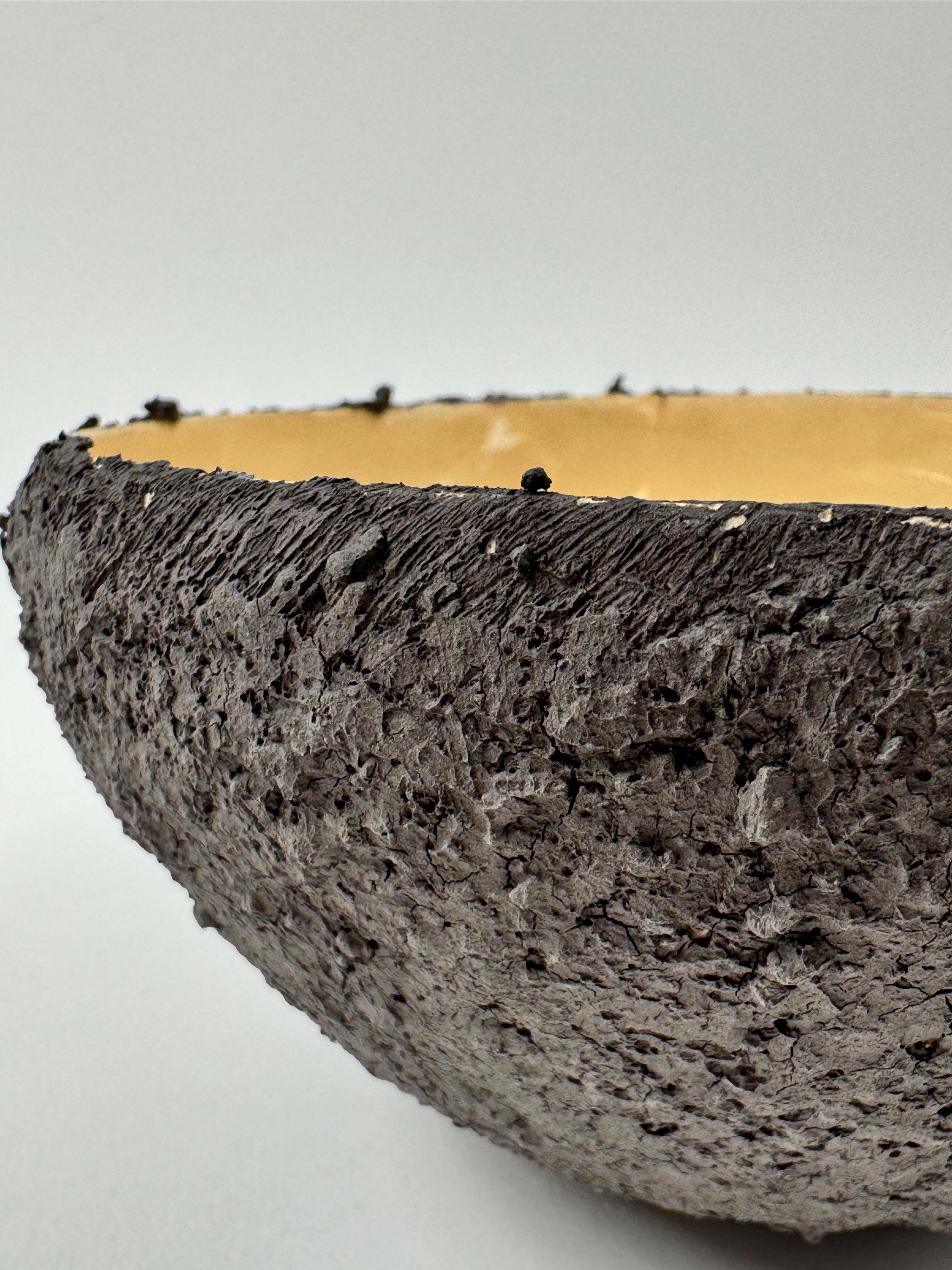 Charred Edge Ceramic Bowl — Ash Texture Meets Golden Calm

Dimensions: Approx. 15 cm diameter × 8 cm height
Origin: Lithuania
Material: Stoneware with blackened exterior and pale yellow glaze
Firing: 100% solar & wind energy
One of a kind

This