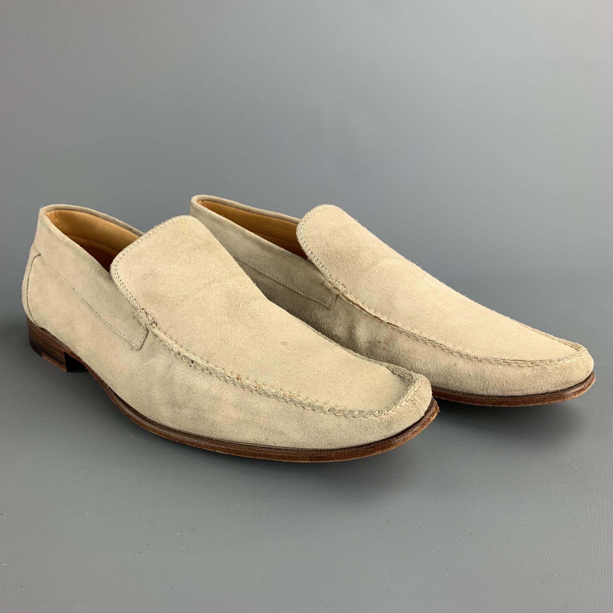 SUTOR MANTELLASSI loafers comes in a natural suede featuring a square toe and a wooden sole. Made in Italy.

Fair Pre-Owned Condition.
Marked: 11

Outsole:

12 in. x 3.5 in. 