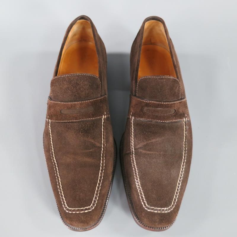SUTOR MANTELLASSI loafers comes in brown suede featuring a square toe front, contrast stitching, penny loafer style, and a rubber sole. Made in Italy.Fair Pre-Owned Condition Marked Size: 7 1/2MeasurementsLength: 11 inWidth: 4 in
  
  
 
Reference: