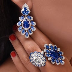Sutra Ring aus 18 Karat Gold mit Cabochon-Tansanit, blauen Saphiren und Diamanten