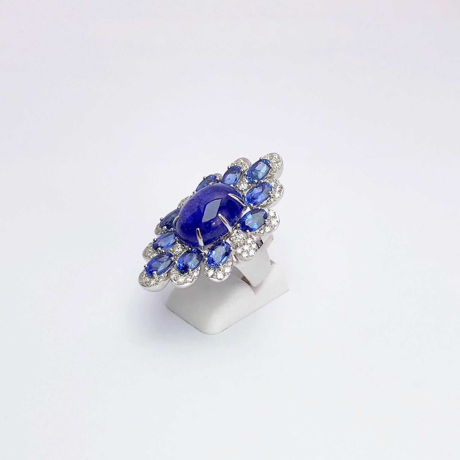 Modern Sutra 18 Karat Gold Ring with Cabochon Tanzanite, Blue Sapphires and Diamonds
