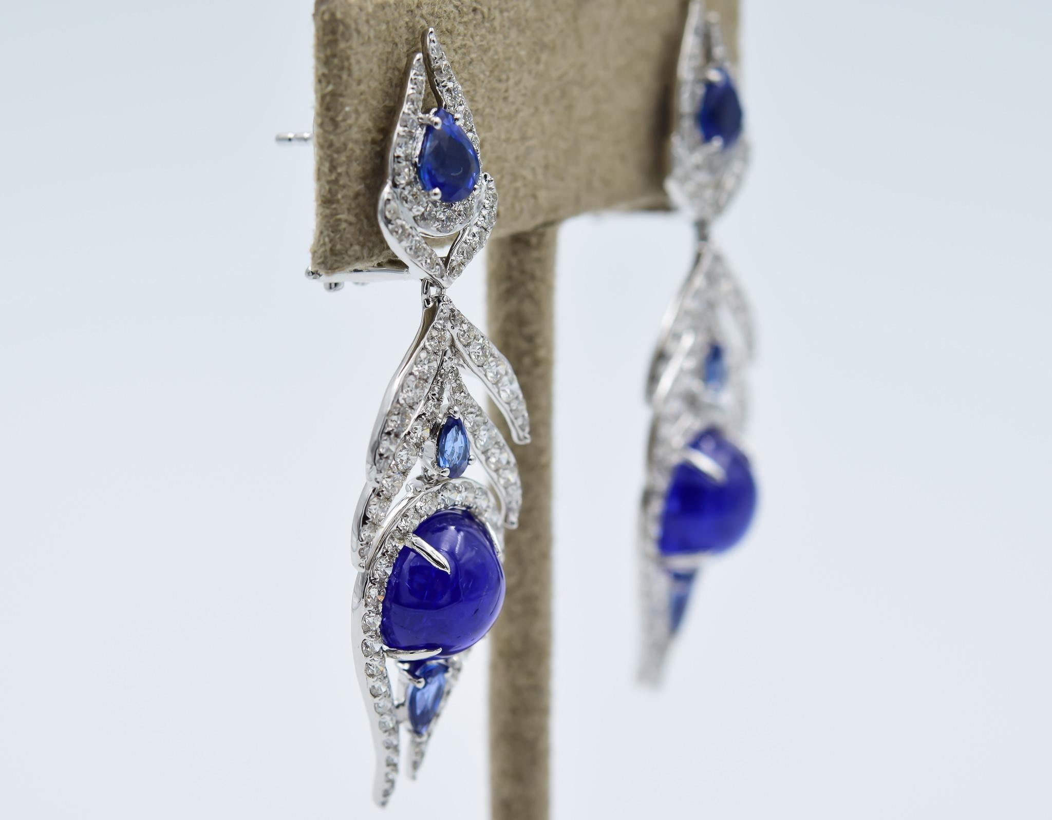 Designer: Sutra
Model Name: Feather
Model Number: SJE2782
Material: 18k White Gold
Gemstones: Diamond, Tanzanite, Sapphire
Carat Weight: 11.09 Tanzanite, 2.72 Diamond, 2.31 Sapphire
Style of Earring: Chandelier
Original Retail	$12,750
Store SKU: