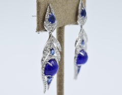 Sutra Feather Earrings in 18 Karat Gold with Tanzanite Sapphire and Diamond
